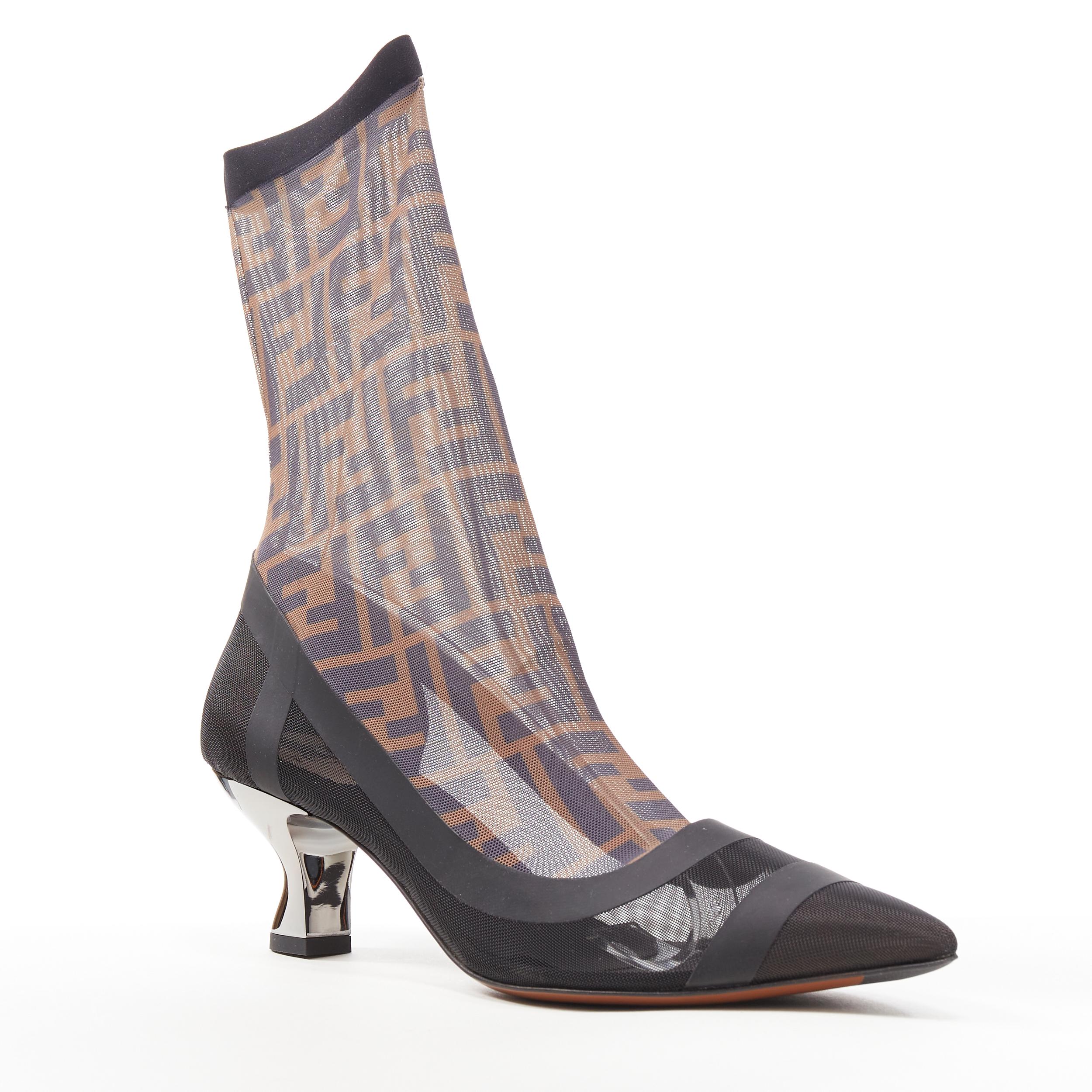 new FENDI FF Zucca monogram sheer sock black kitten heel bootie pump EU39 
Reference: TGAS/B00360 
Brand: Fendi 
Material: Fabric 
Color: Brown 
Pattern: Other 
Extra Detail: Sheer sock knit upper. Rubberized trimming. Silver metallic curved kitten