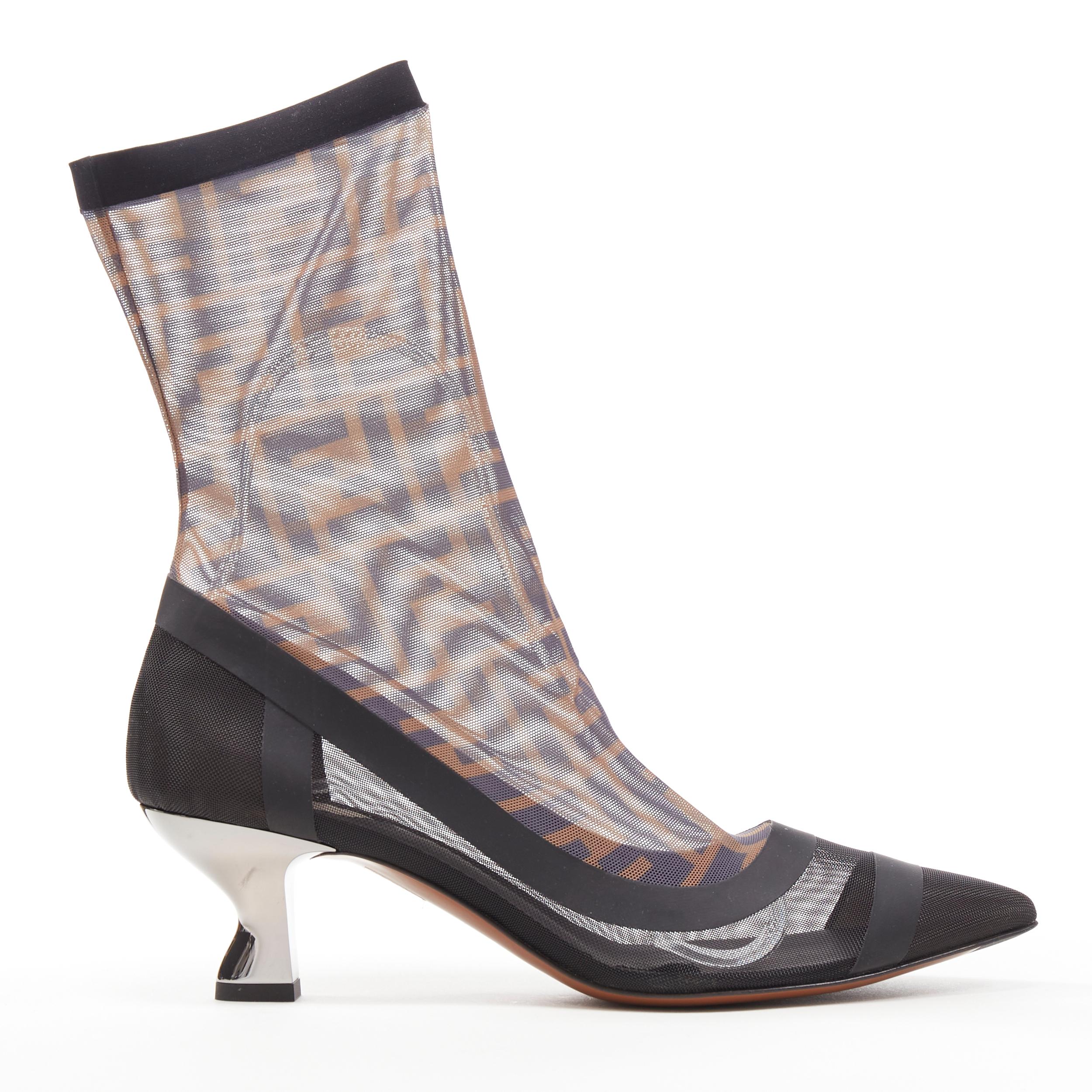 new FENDI FF Zucca monogram sock black silver kitten heel bootie pump EU38.5 
Reference: TGAS/B00356 
Brand: Fendi 
Material: Fabric 
Color: Brown 
Pattern: Other 
Extra Detail: Sheer sock knit upper. Rubberized trimming. Silver metallic curved