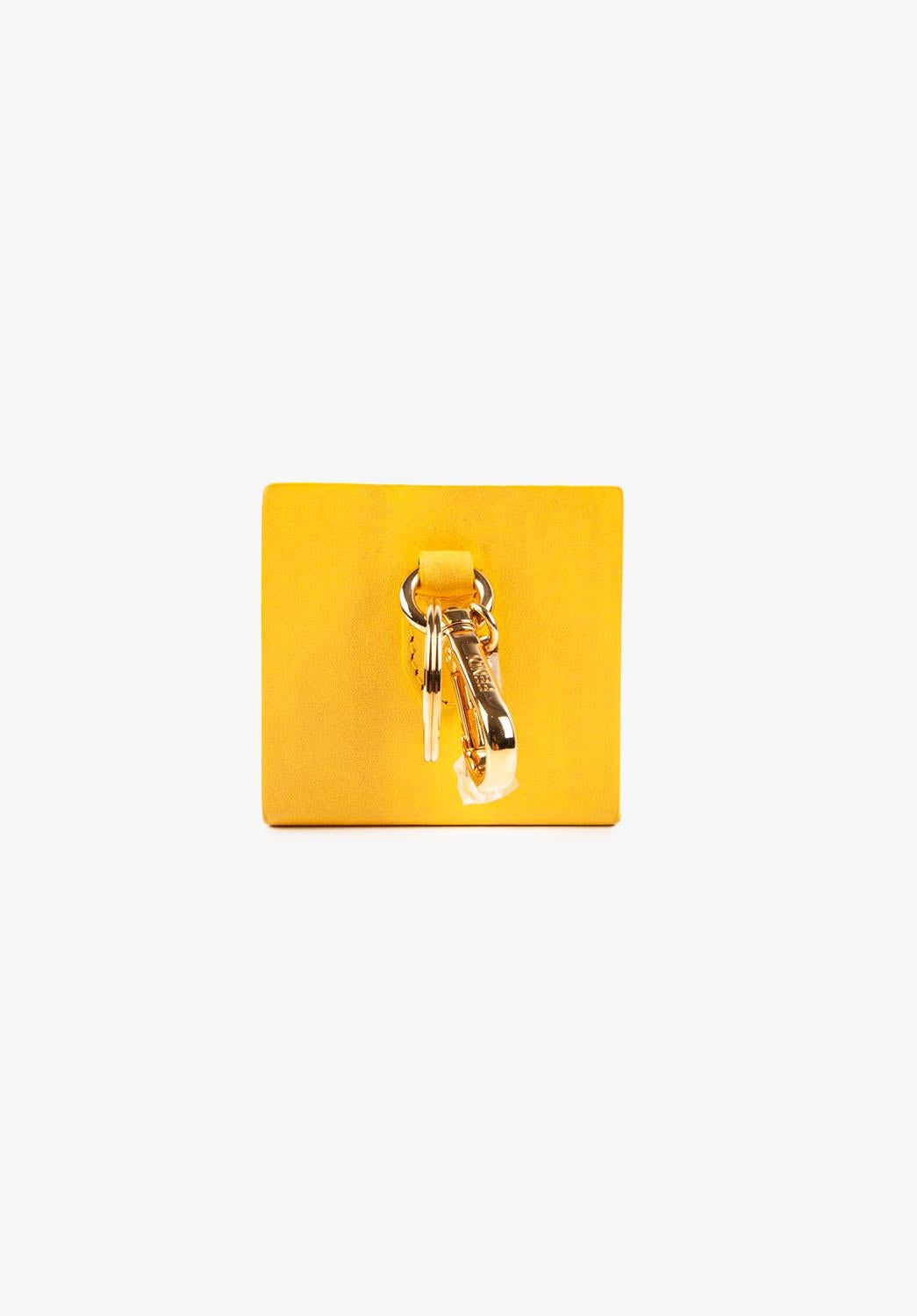 Check my other listings. Have many more designer clothes for sale. Open to any offers.
Item for sale is 100% genuine Fendi Money Box Women, Key Chain, S1158, VIPE0
Color: yellow
(An actual color may a bit vary due to individual computer screen