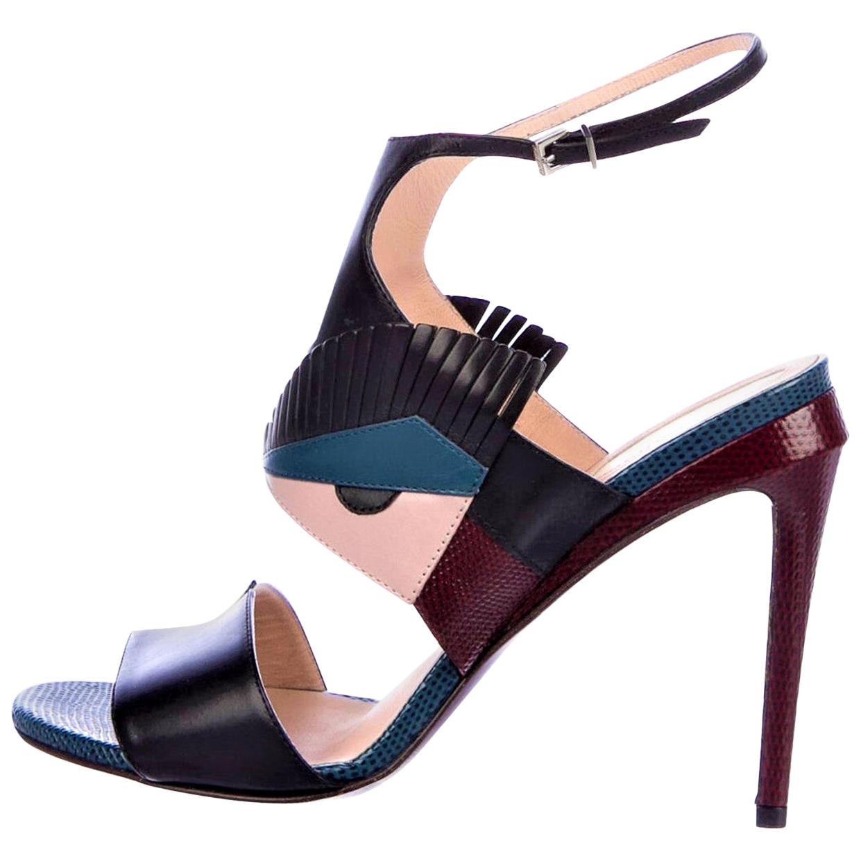 Fendi Karl Lagerfeld
Monster Bugs Leather Heels
* Retail $1375
* Size 37.5
* Silver Adjustable Strap
Monster Bugs
*Blue Black Pink-Cream Leather
* Leather Insole
Heel 4.25