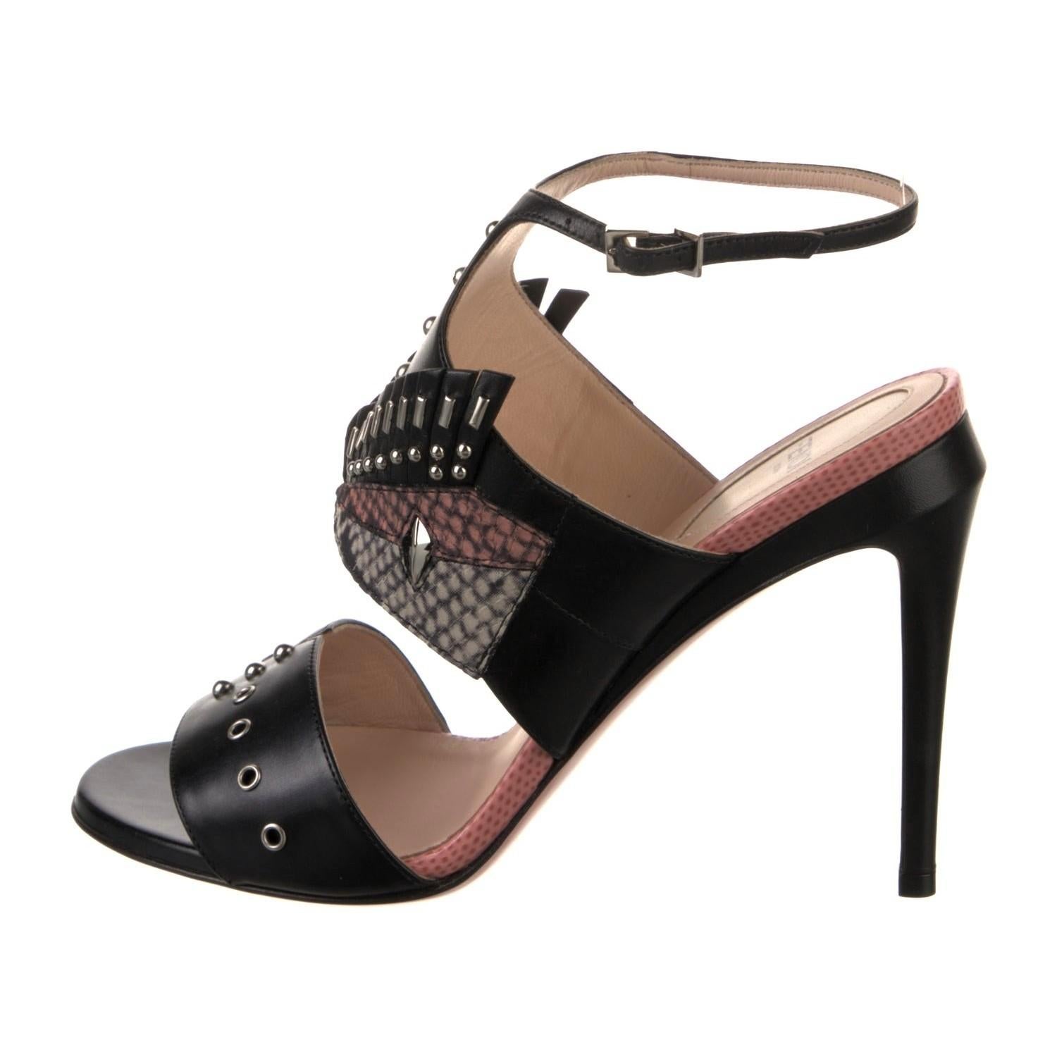 Fendi 
Monster Bugs Leather Heels
* Retail $1475
* Size 38
* Silver Adjustable Ankle Strap
Silver Studded Leather 
* Leather Insole
Heel 4.5