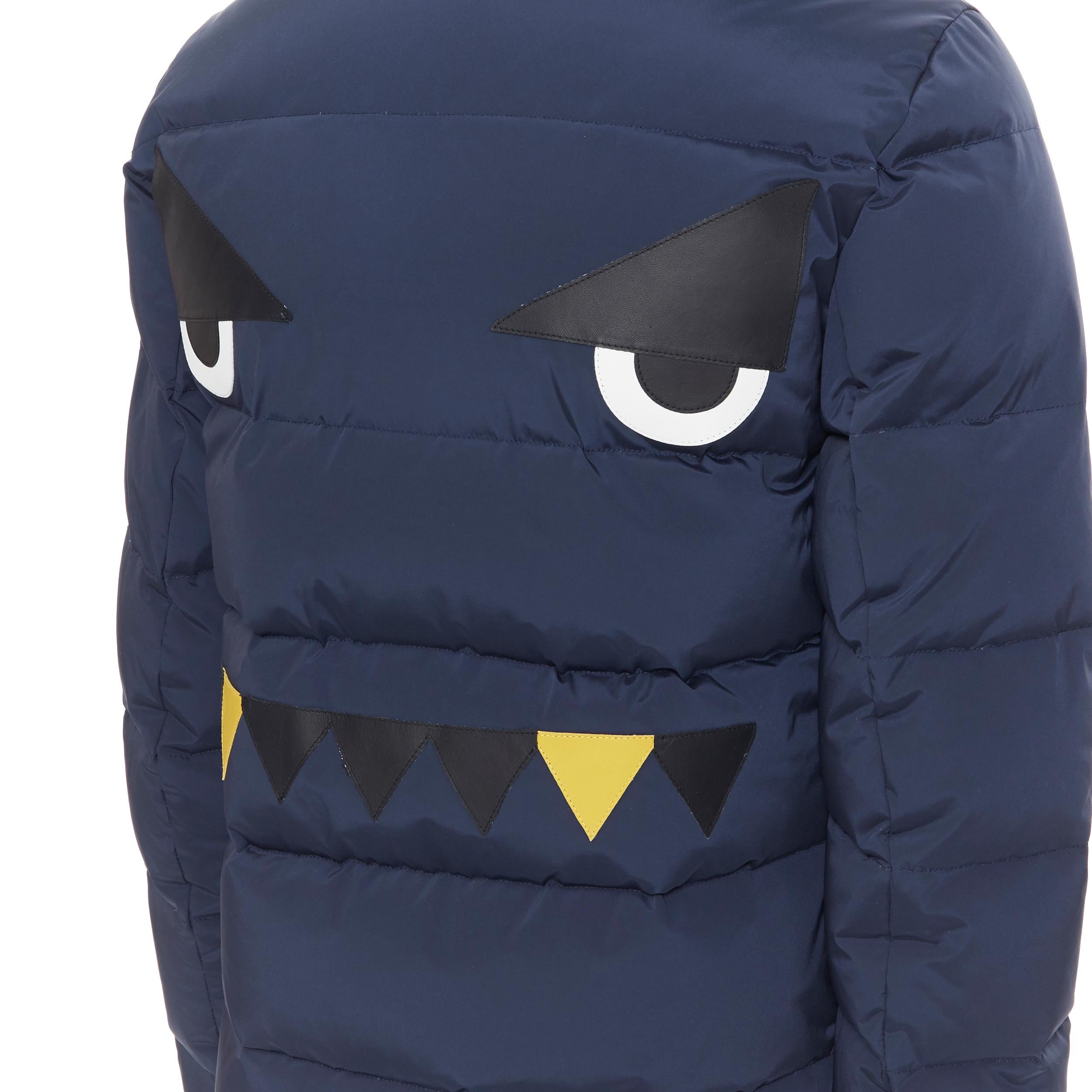 new FENDI Monster Face Ski navy blue goose down padded puffer jacket IT46 S
Brand: Fendi
Model Name / Style: Monster Ski
Material: Polyester
Color: Navy
Pattern: Solid
Closure: Zip
Extra Detail: Signature Monster face at back face. Goose down