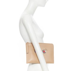 new FENDI Monster Faces tan brown stud embellished zip around pouch clutch bag