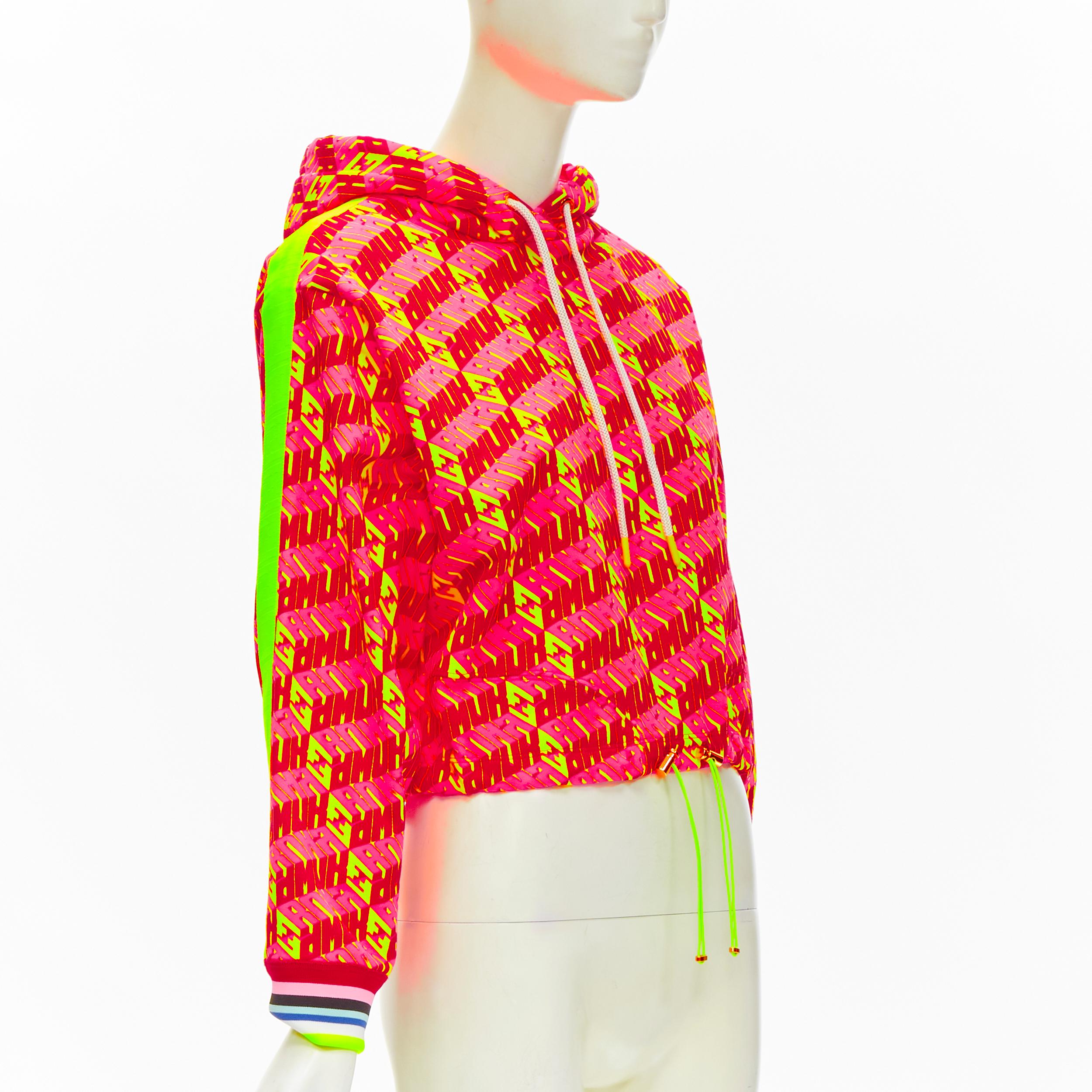 new FENDI Roma Amor neon pink yellow FF Zucca monogram cropped hoodie XS
Brand: Fendi
Collection: Roma Amor 
Material: Cotton
Color: Pink
Pattern: Graphic
Closure: Drawstring
Extra Detail: Rubberized tips. Gold-tone hardware. Toggle drawstring at