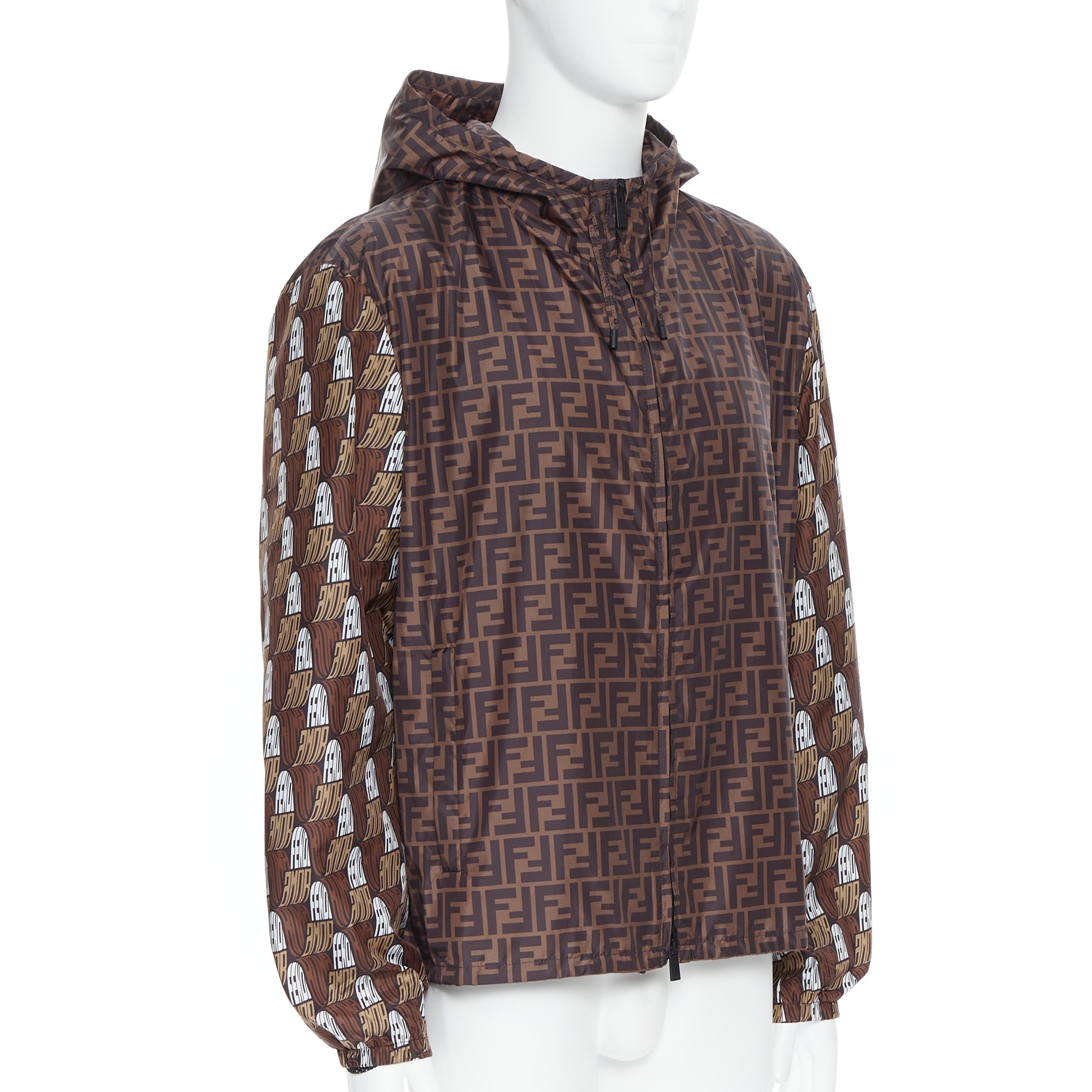 new FENDI Roma Amor Zucca monogram print gold embroidery windbreaker jacket IT52 
Reference: TGAS/B00365 
Brand: Fendi 
Material: Nylon 
Color: Brown 
Pattern: Other 
Closure: Zip 
Extra Detail: Zucca monogram print. Fendi Roma Amor print on both