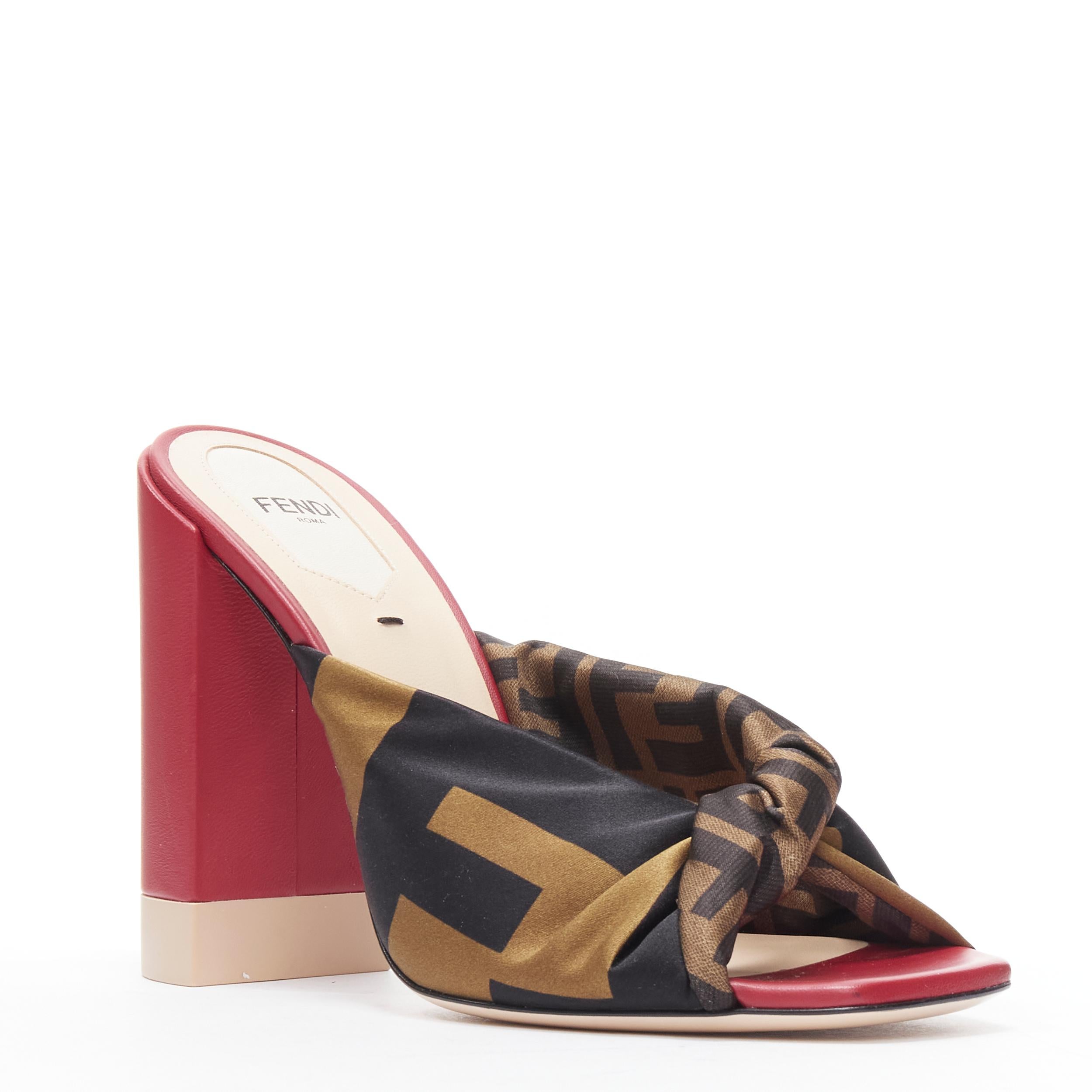 new FENDI Silk Sabot Zucca FF monogram twist red block heel mule EU38 
Reference: TGAS/B01592 
Brand: Fendi 
Model: Silk sabot mule 
Material: Silk 
Color: Brown 
Extra Detail: Twist monogram silk Sabot. Block heel. 
Made in: Italy 

CONDITION: