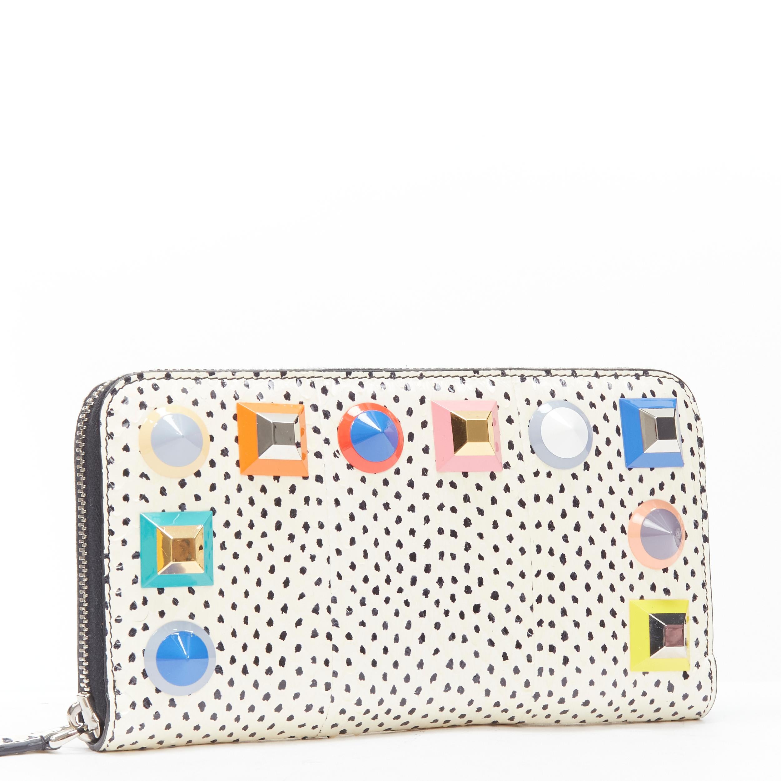 new FENDI white dotted scaled leather Rainbow studs long zip continental wallet 
Reference: MELK/A00175 
Brand: Fendi 
Material: Leather 
Color: White 
Pattern: Dotted 
Closure: Zip 
Extra Detail: 8-card slot. 4 separated compartments. 
Made in: