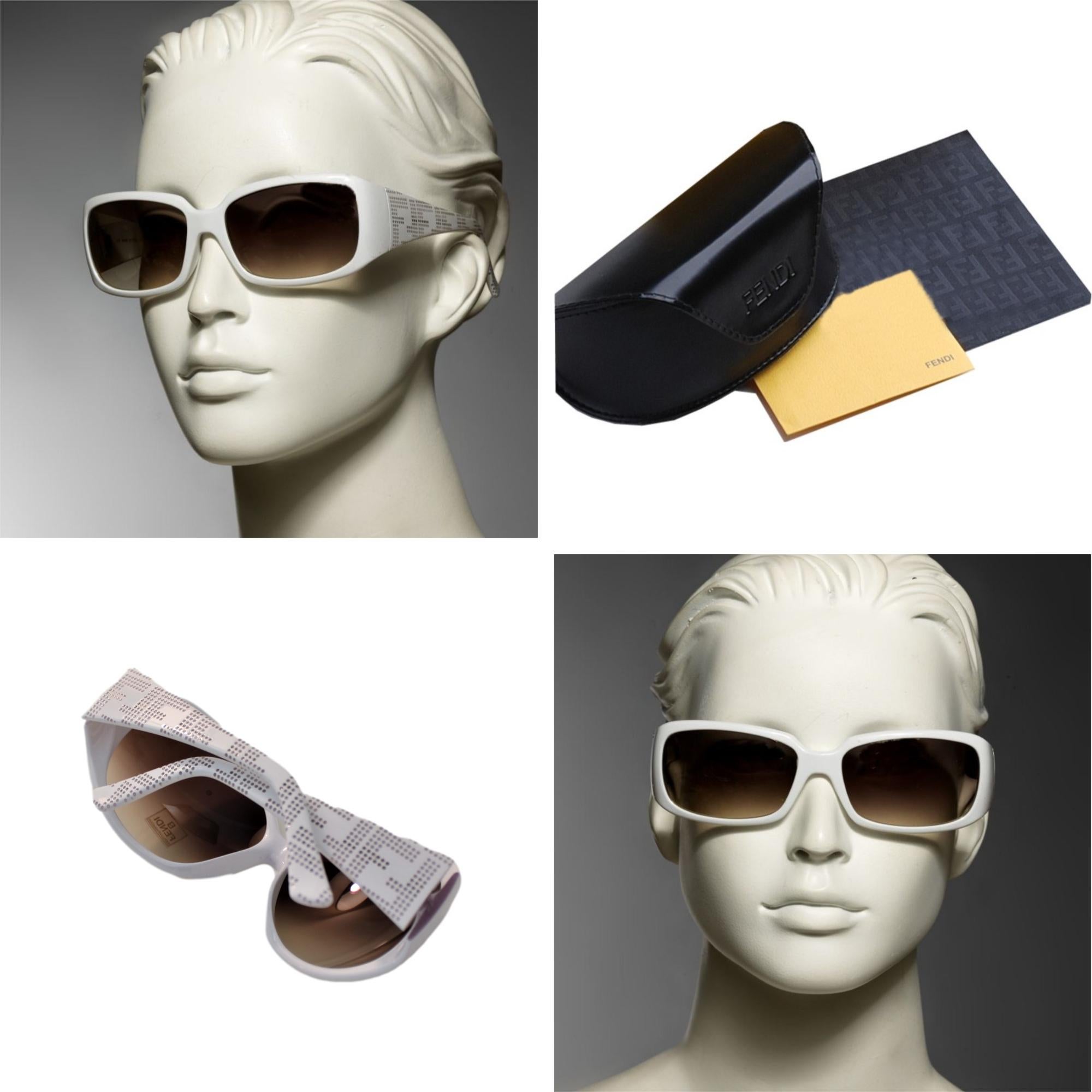 New Fendi Off White Sunglasses with Case

Brand New
Slight Reflective Lenses
FF Sides
Beautiful White Frames
58-17-135
Lightweight Scratch and Impact Resistant
Made in Italy
100% UVA/UVB Protection
With Case & Cleaning Clothing