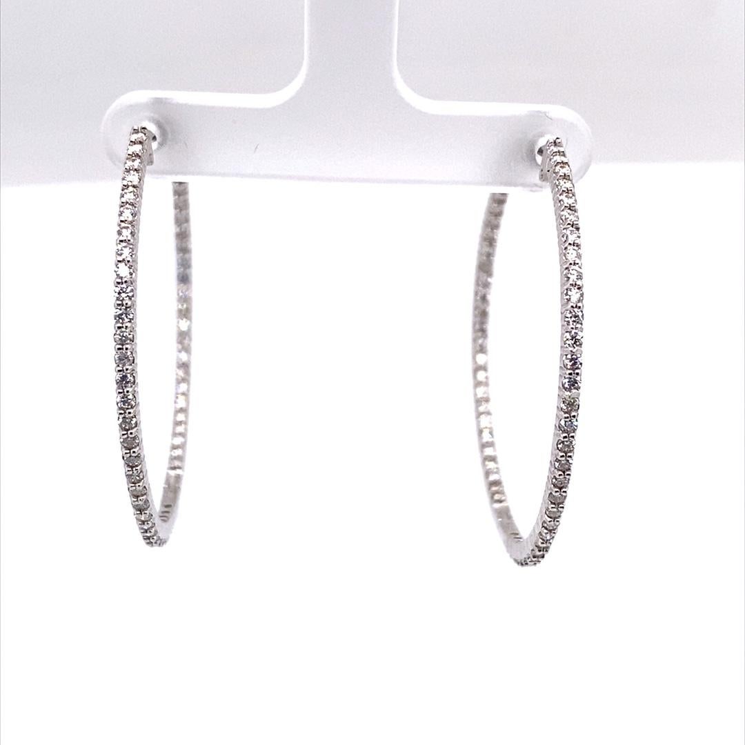 New Fine Quality Hoop Earrings Set with 2.75ct of Diamonds in 18ct White Gold

These pair of 18ct white gold earrings is set with 2.75ct of diamonds. The earrings are designed in a hoop style.

Additional Information:
Total Diamond Weight: