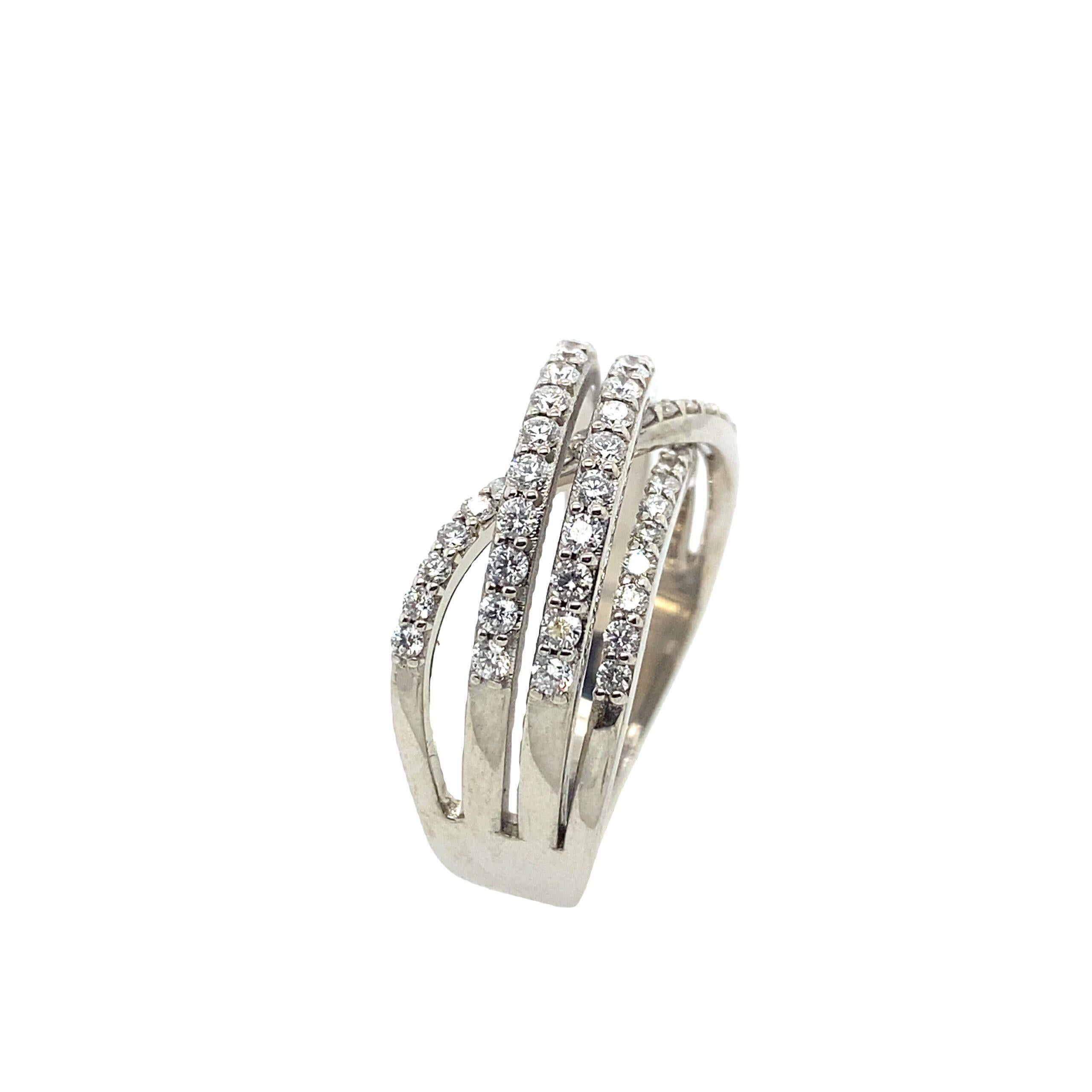 New Fine Quality 4 Row Diamond Dress Ring, Set in 18ct White Gold, TDW 0.80ct

Additional Information:
Set in 18ct White Gold
Total Diamond Weight: 0.80ct 
Diamond Colour: F/G
Diamond Clarity: VS
Total Weight: 8.5g  
Ring Size: P
SMS3277