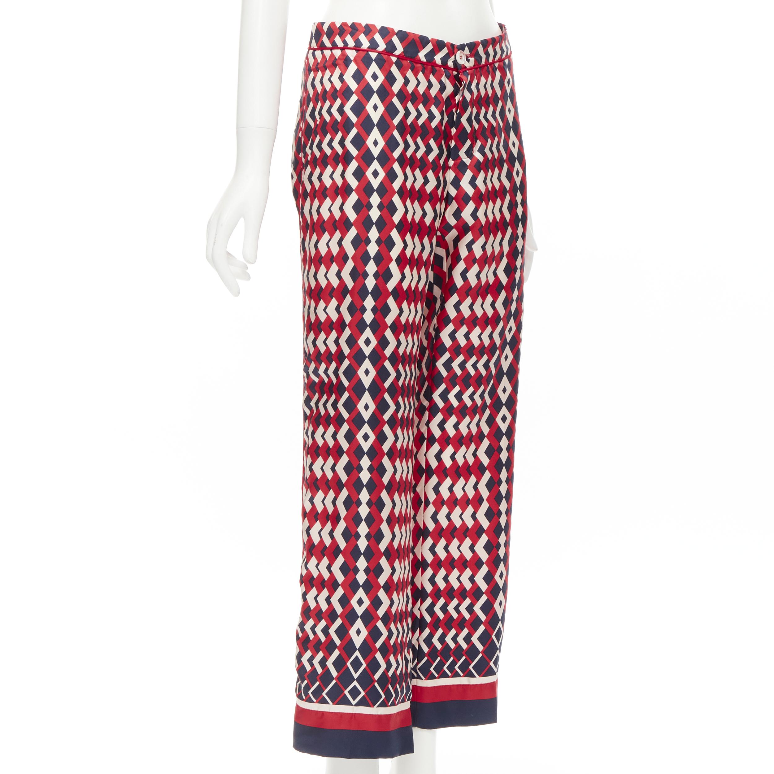 new FOR RESTLESS SLEEPER FRS 100% silk blue red geometric print pants L 
Reference: AEMA/A00096 
Brand: For Restless Sleepers 
Material: Silk 
Color: Red 
Pattern: Geometric 
Closure: Button 
Extra Detail: Mother-of-pearl concealed button fly. Red