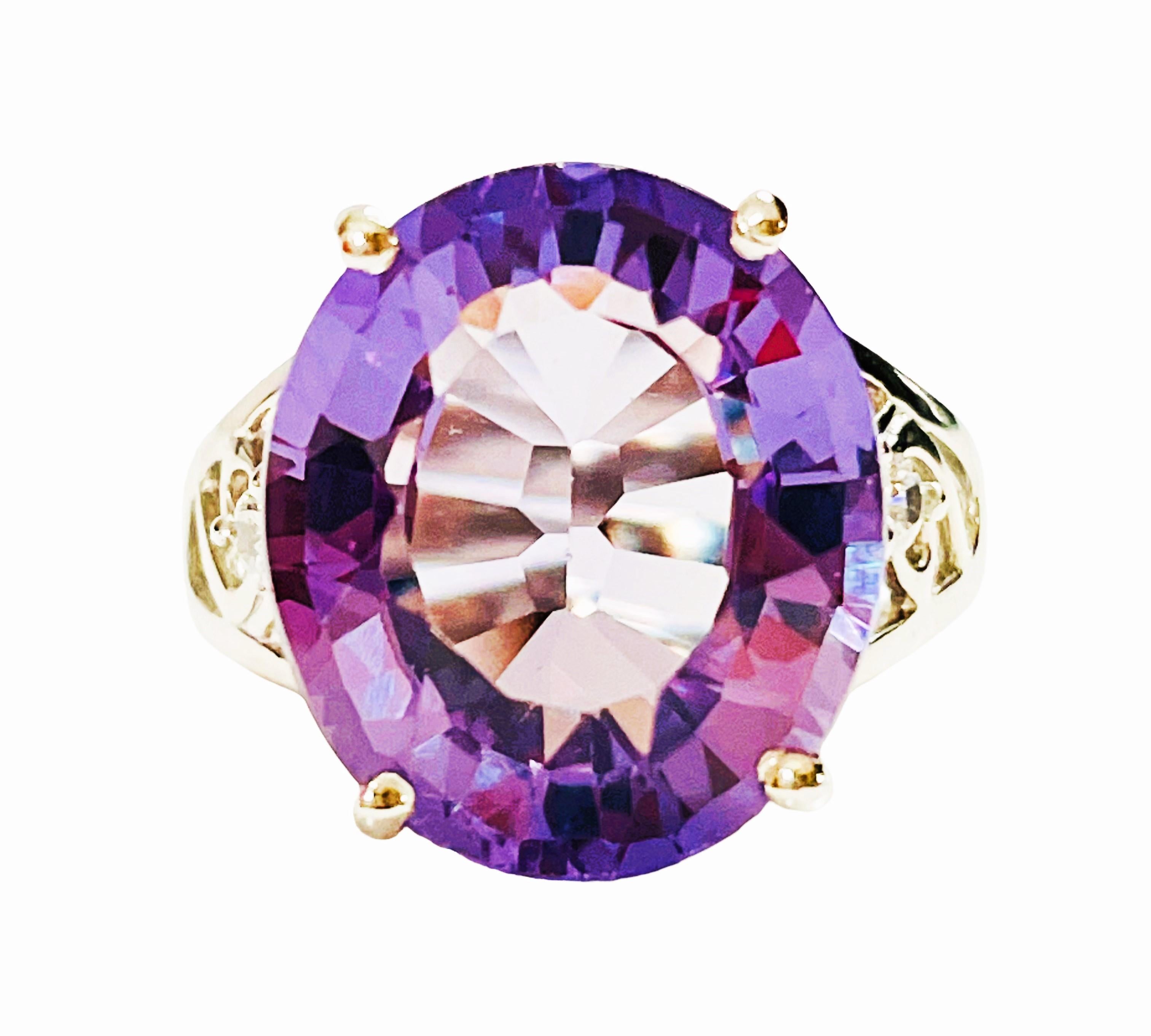 What a gorgeous ring!  The ring is a size 5.75.   It was mined in Africa and is just an exquisite color-changing Spinel.  A very high quality stone and free of any inclusions.   It is an oval cut stone and is 12.30  Cts.   The main stone is 15.2 x
