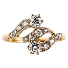 Bague à motif ajourée en or jaune 18 carats et platine avec diamants français