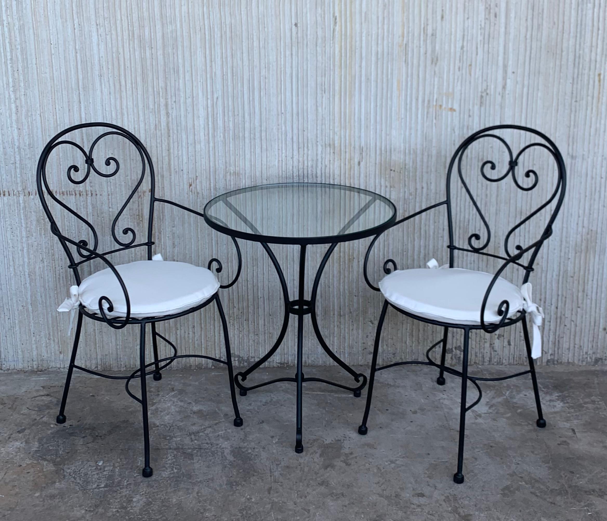 New French wrought iron painting garden bistro outdoor set

The price includes two armchairs with cushions and one top glass table. Available now in black.

If you want other combination you can choose colors and top finishes (wood, marble,