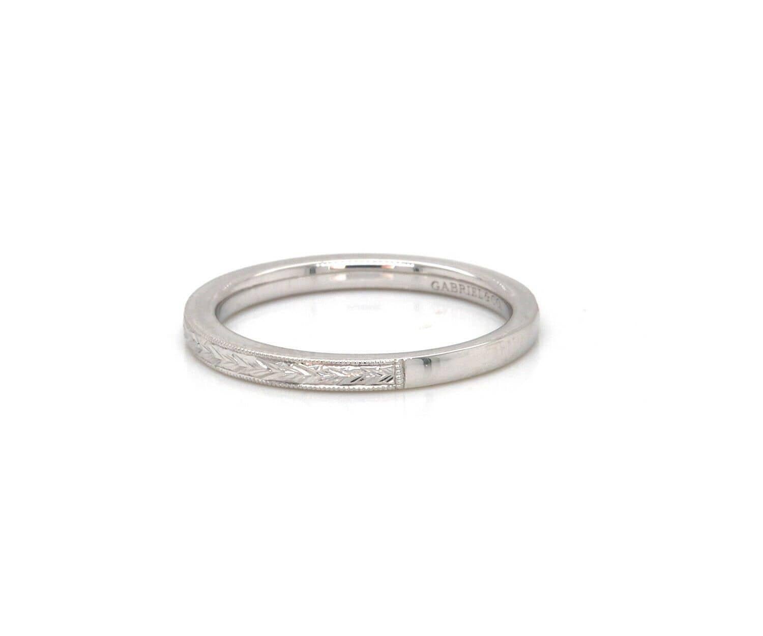 New Gabriel & Co. Filigree Engraved Band Ring in 14K

Gabriel & Co. Filigree Engraved Band Ring
14K White Gold
Band Width: Approx. 2.0 MM
Ring Size: 6.50 (US)
Weight: Approx. 2.40 Grams
Stamped: GABRIEL & CO., 14K, S1279713

Condition:
Offered for