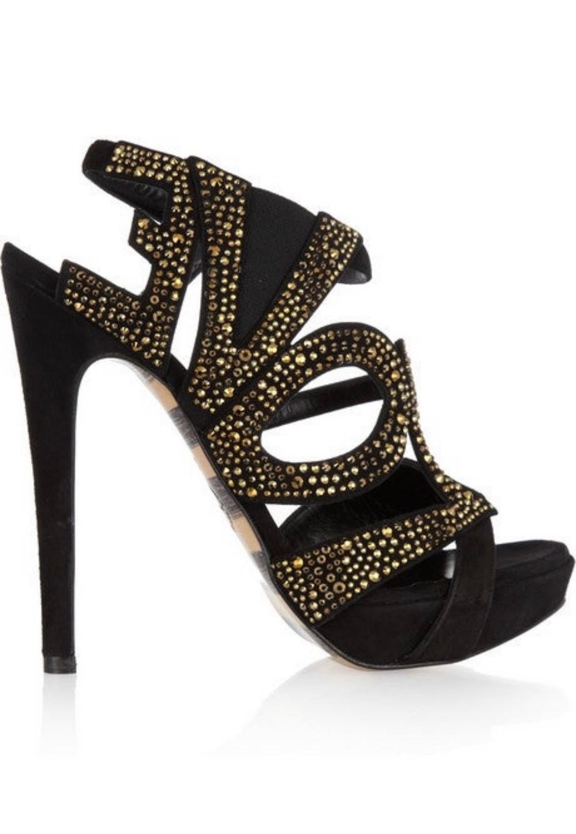 Shake up your cocktail style 
with Georgina Goodman's fabulous crystal-studded sandals.
Team them with a slinky sequined dress for high-shine evening appeal. 
Heel measures approximately 140mm/ 5.5 inches with a 25mm/ 1 inch platform 
Black suede
