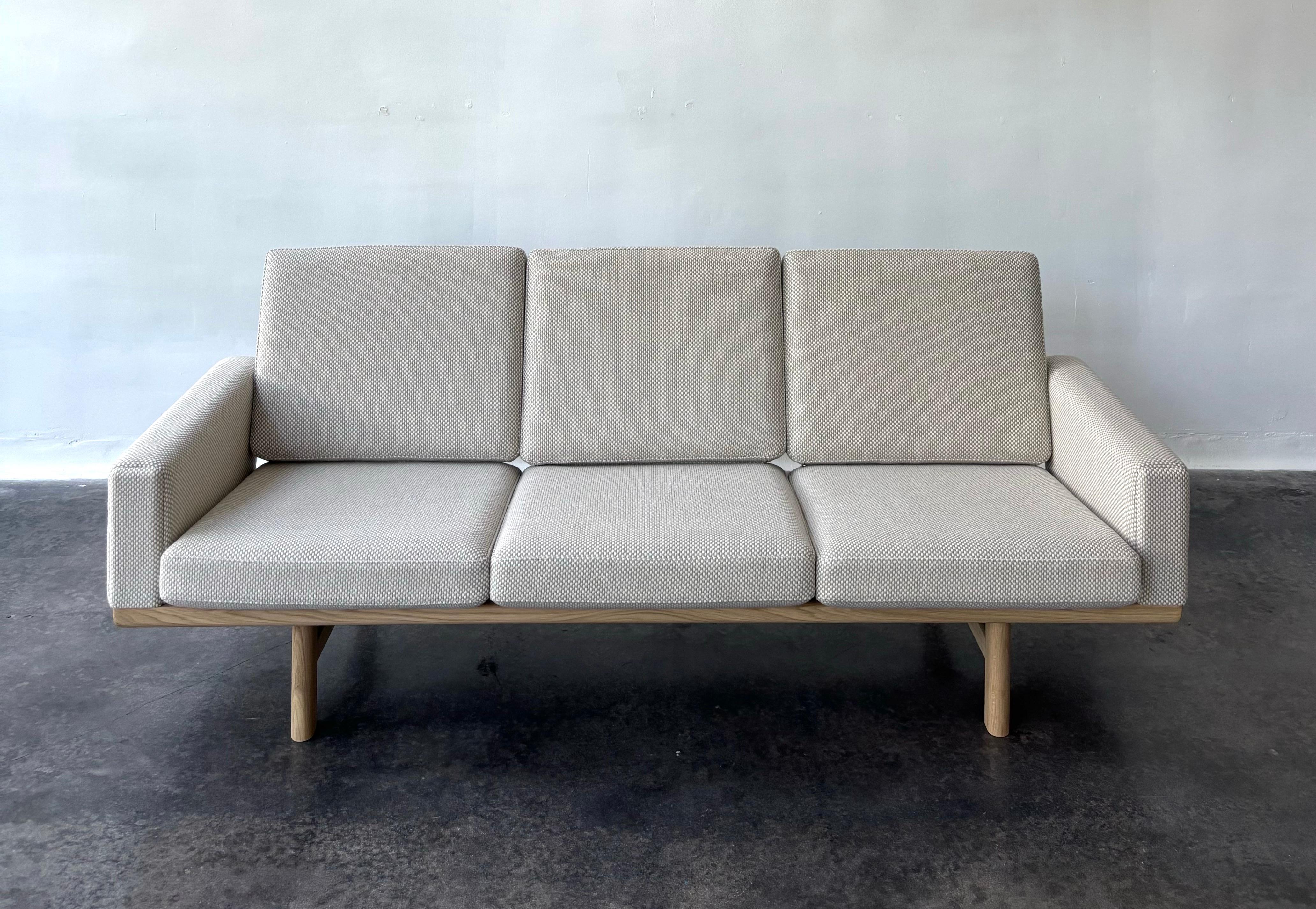 Hand-Crafted New Getama GE236 Sofa 3-Seater, Original Hans Wegner produced in 2023 For Sale