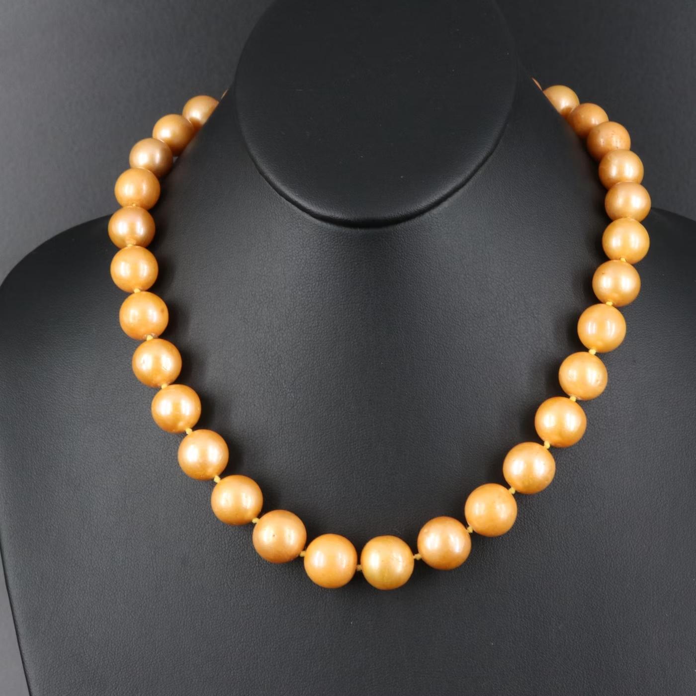 GIA certified Necklace, Comes with GIA certificate #5221017043 

NEW with tags and GIA certificate

Amazing Design with a large pearls:
- Cultured Pearl
- Shape:	Near-Round
- Pearls Dimensions:	10.44 × 10.32 – 13.88 mm
- Certification: GIA Pearl