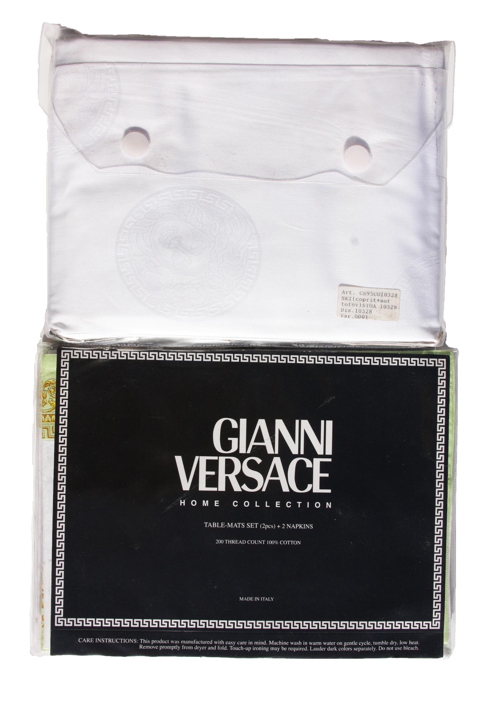 New and Rare Gianni Versace Home Collection Medusa Print 10 pc Table Set
Colors: Soft Green, Soft Brown and Yellow, 100% Cotton, 200 Thread Count
Table Set Includes:
1 Table Cloth Square - 55 x 55 inches (140 x 140 cm) - with Design Around 
1 Under