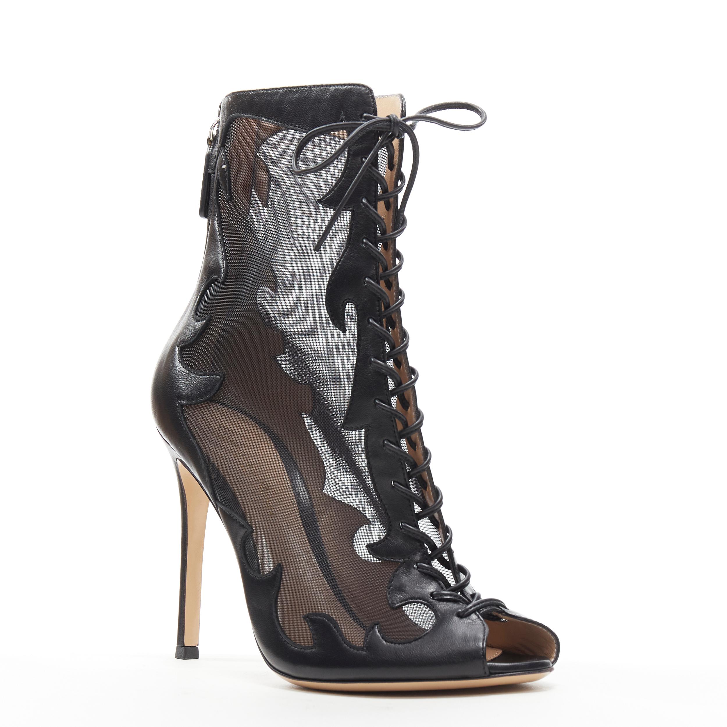 new GIANVITO ROSSI black sheer flame leather peep toe lace up ankle bootie EU38 
Reference: LNKO/A01787 
Brand: Gianvito Rossi 
Designer: Gianvito Rossi 
Material: Leather 
Color: Black 
Pattern: Solid 
Closure: Zip Extra Detail: Flame cut out.