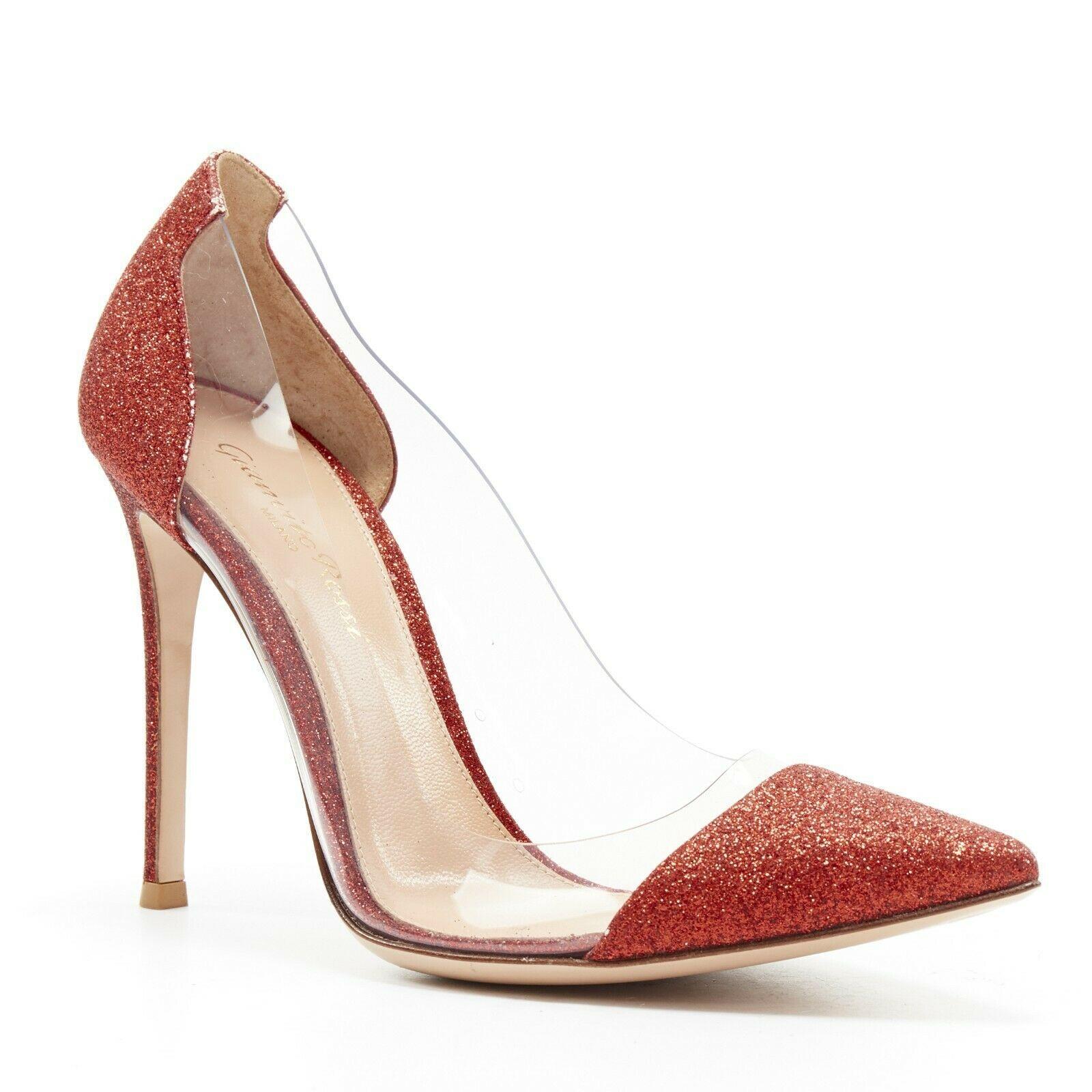 new GIANVITO ROSSI Plexi 100 red glitter leather clear PVC point toe pump EU37

GIANVITO ROSSI
Plexi 100. Red fine glitter covered leather. Clear PVC body. Pointed toe. Covered heel. Slim high heel. Padded leather lining. Leather sole. Made in