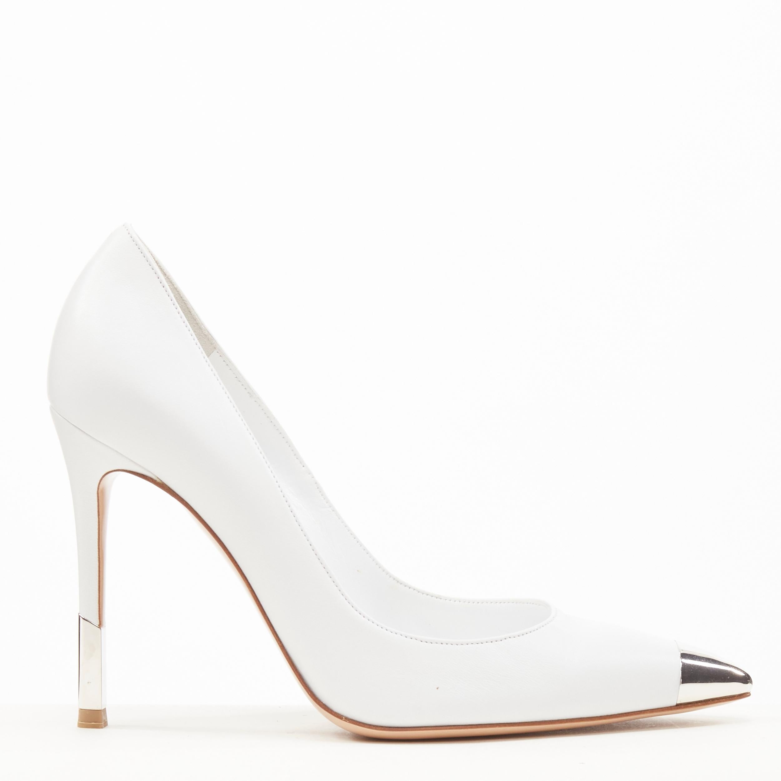 new GIANVITO ROSSI white leather silver metal toe heel tip pigalle pump EU37 
Reference: SNKO/A00210 
Brand: Gianvito Rossi 
Material: Leather 
Color: White 
Pattern: Solid 
Extra Detail: Metal toe and heel tip. 
Made in: Italy 

CONDITION: