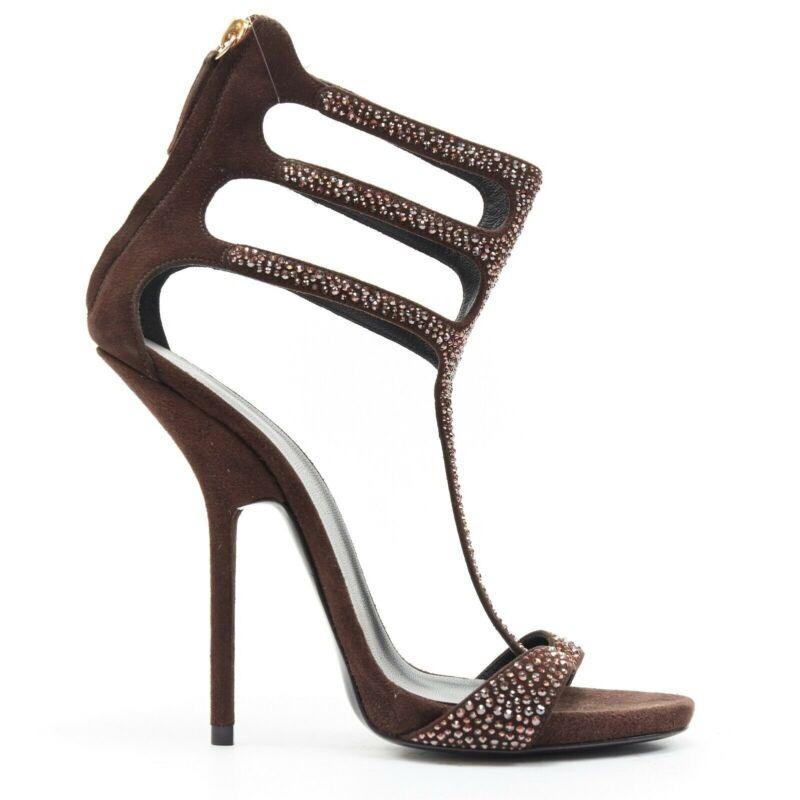 New GIUSEPPE ZANOTTI brown crystal strass T-strap curved heel sandal EU40.5
Reference: TGAS/A03174
Brand: Giuseppe Zanotti
Color: Brown
Pattern: Solid
Closure: Zip
Extra Details: Dark brown suede leather. Tonal crystal embellishment. Triple strap