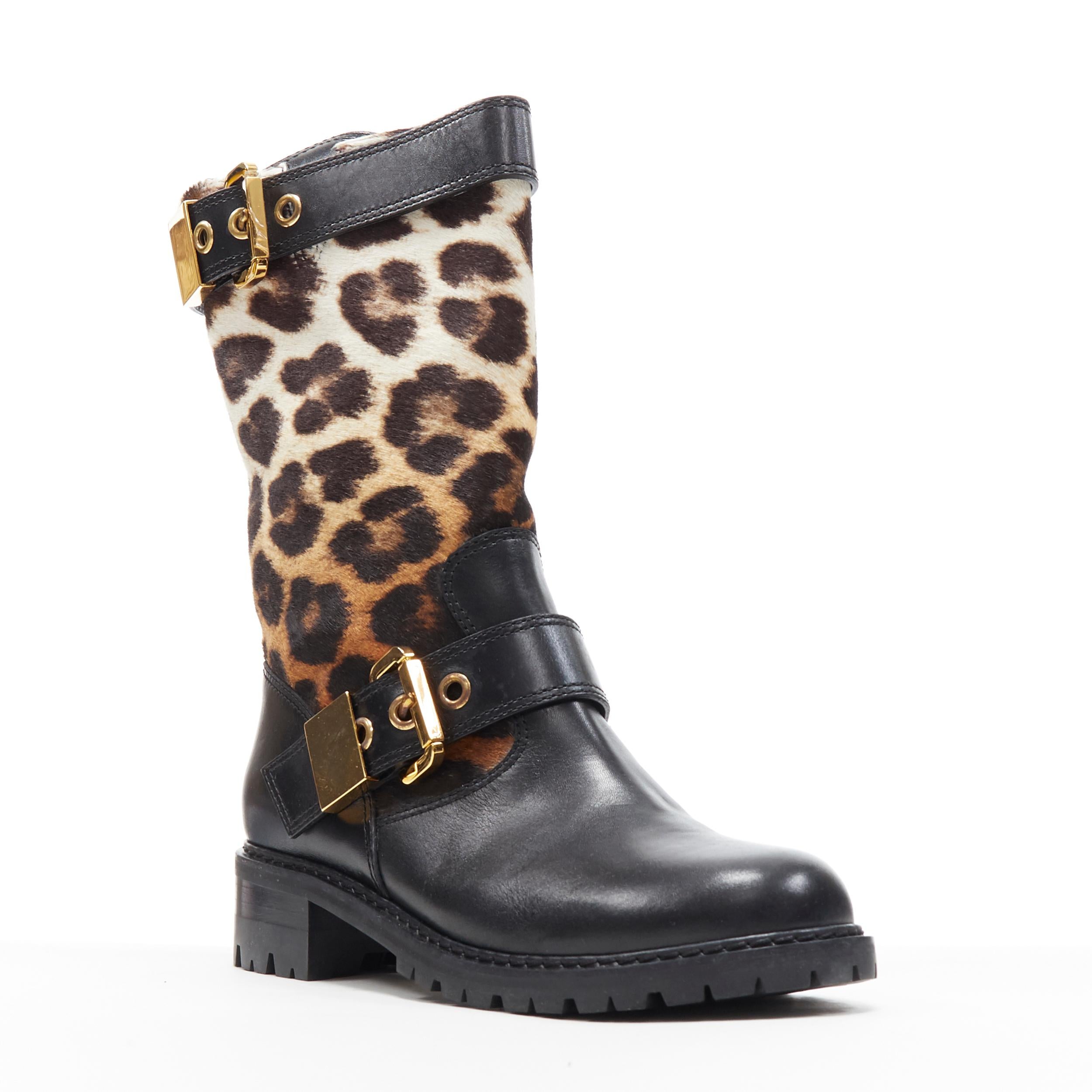 new GIUSEPPE ZANOTTI leopard calfhair black leather gold buckle biker boot EU40
Brand: Giuseppe Zanotti
Designer: Giuseppe Zanotti
Model Name / Style: Leopard boot
Material: Leather
Color: Black, brown
Pattern: Leopard
Closure: Buckle
Extra Detail: