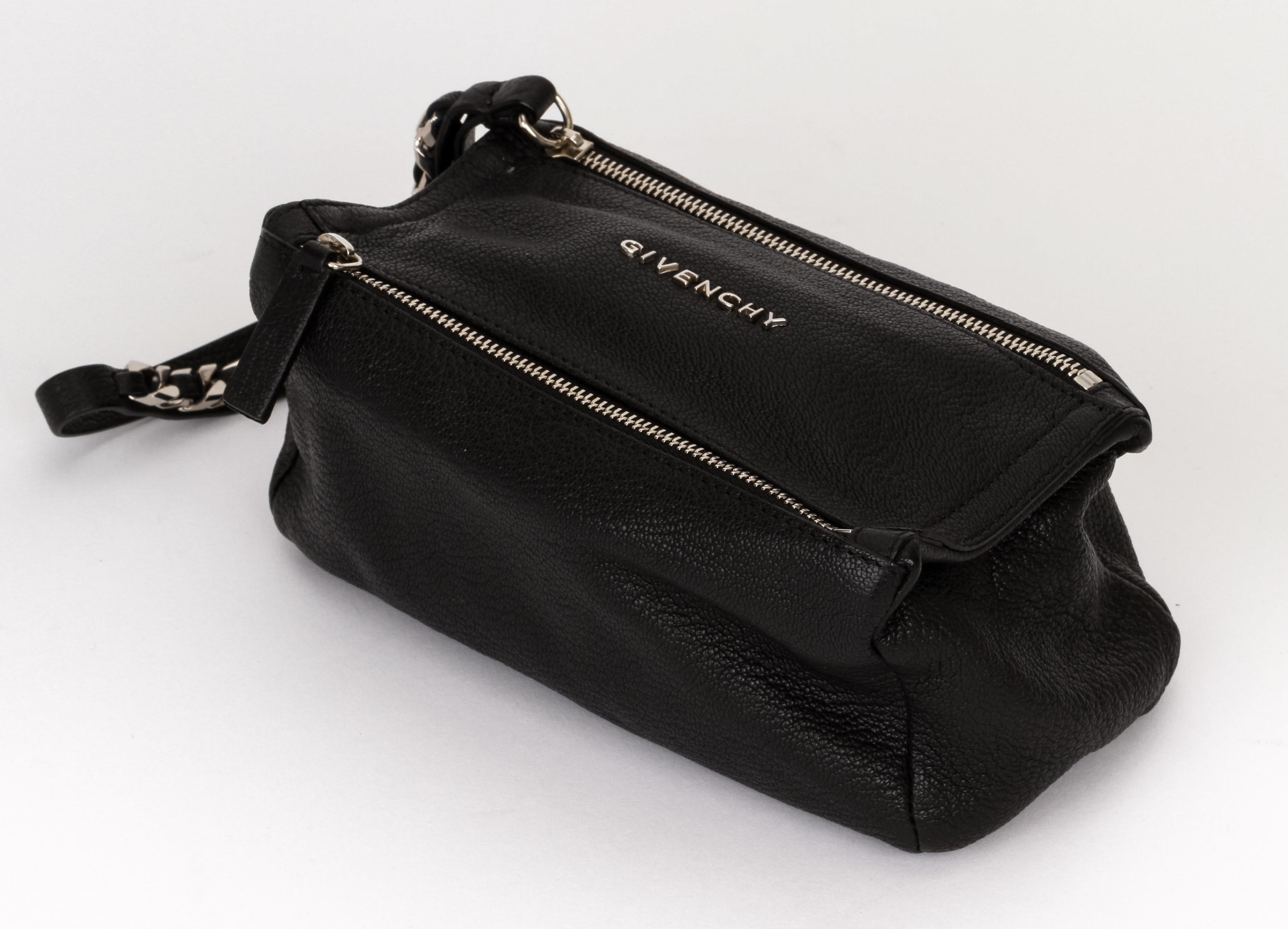 New Givenchy black leather double zip pochette with chain handle. Original dust cover.