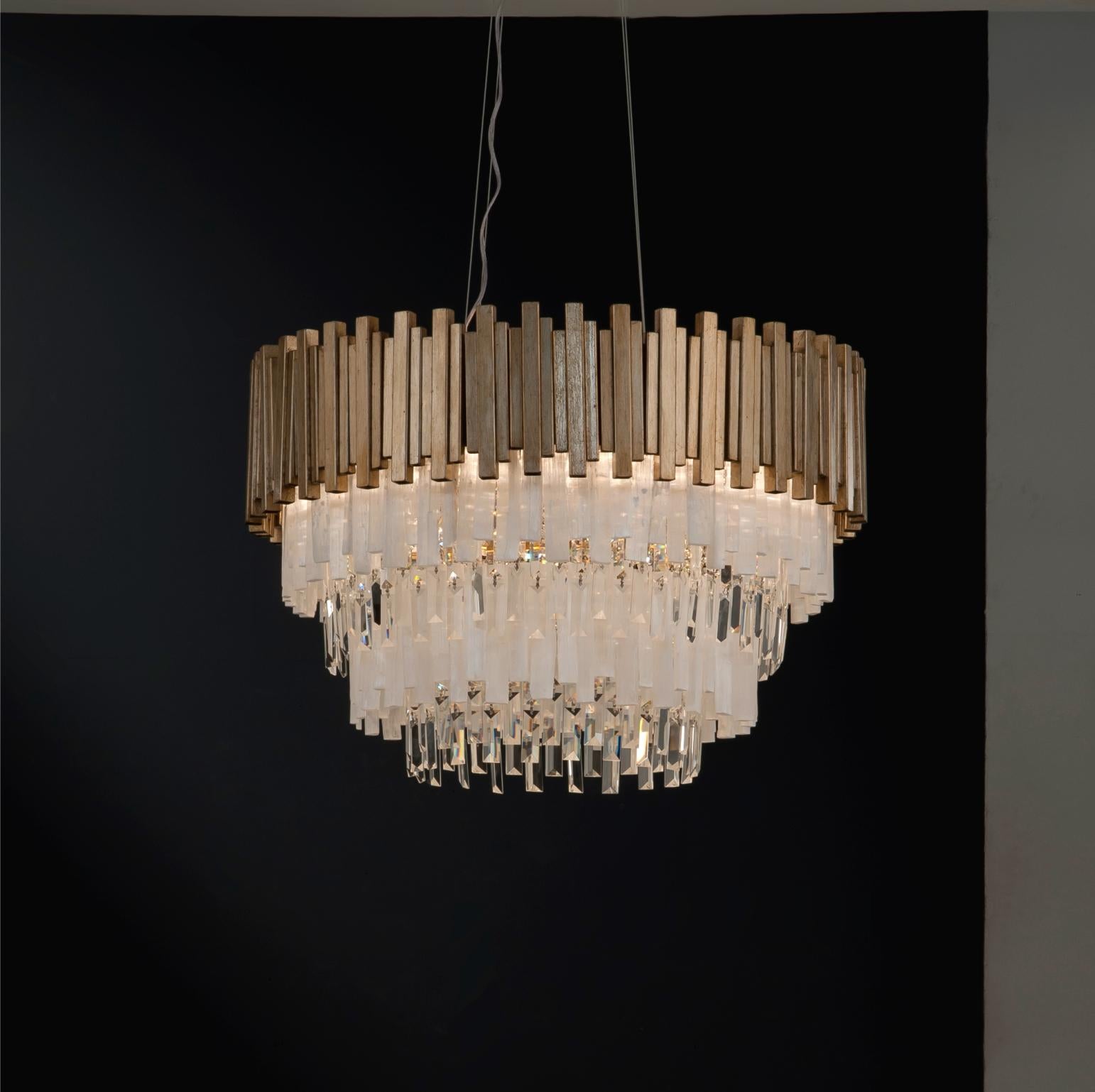 Selenite chandelier lamp by Aver 
Dimensions: diameter 76 x height 48 cm 
Materials: Aluminum, plated. Natural Moroccan/Clear Rock, Moroccan Rock.
Lighting: 12 x E-14 25w.
Finish: silver veneer, aged silver veneer, gold veneer, aged gold veneer,
