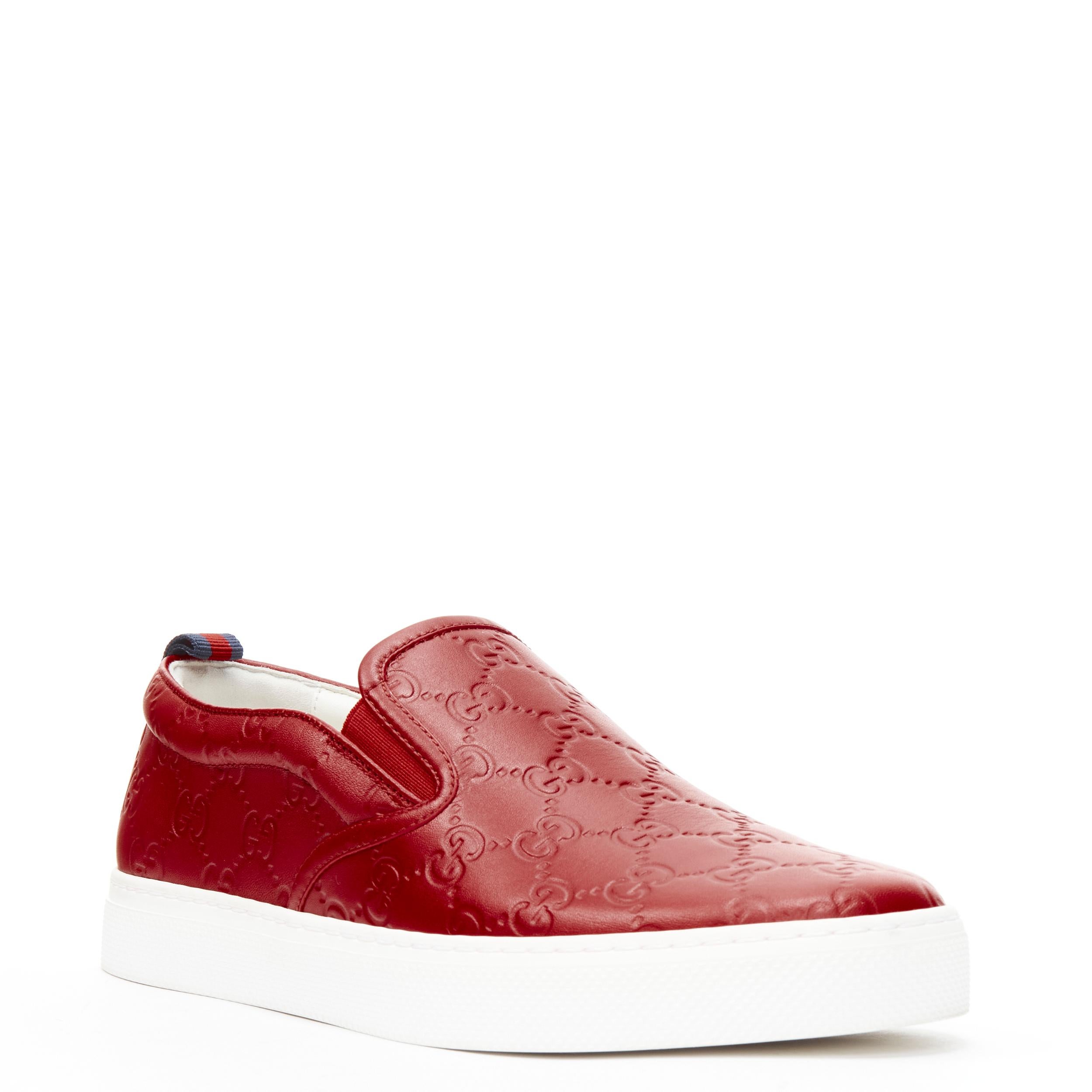new GUCCI 407364 GG Monogram emboss leather slip on skate sneakers UK6 EU40 
Reference: TGAS/B02166 
Brand: Gucci 
Designer: Alessandro Michele 
Model: 407364 
Material: Leather 
Color: Red 
Pattern: Solid 
Extra Detail: 407364. Red Gucci embossed