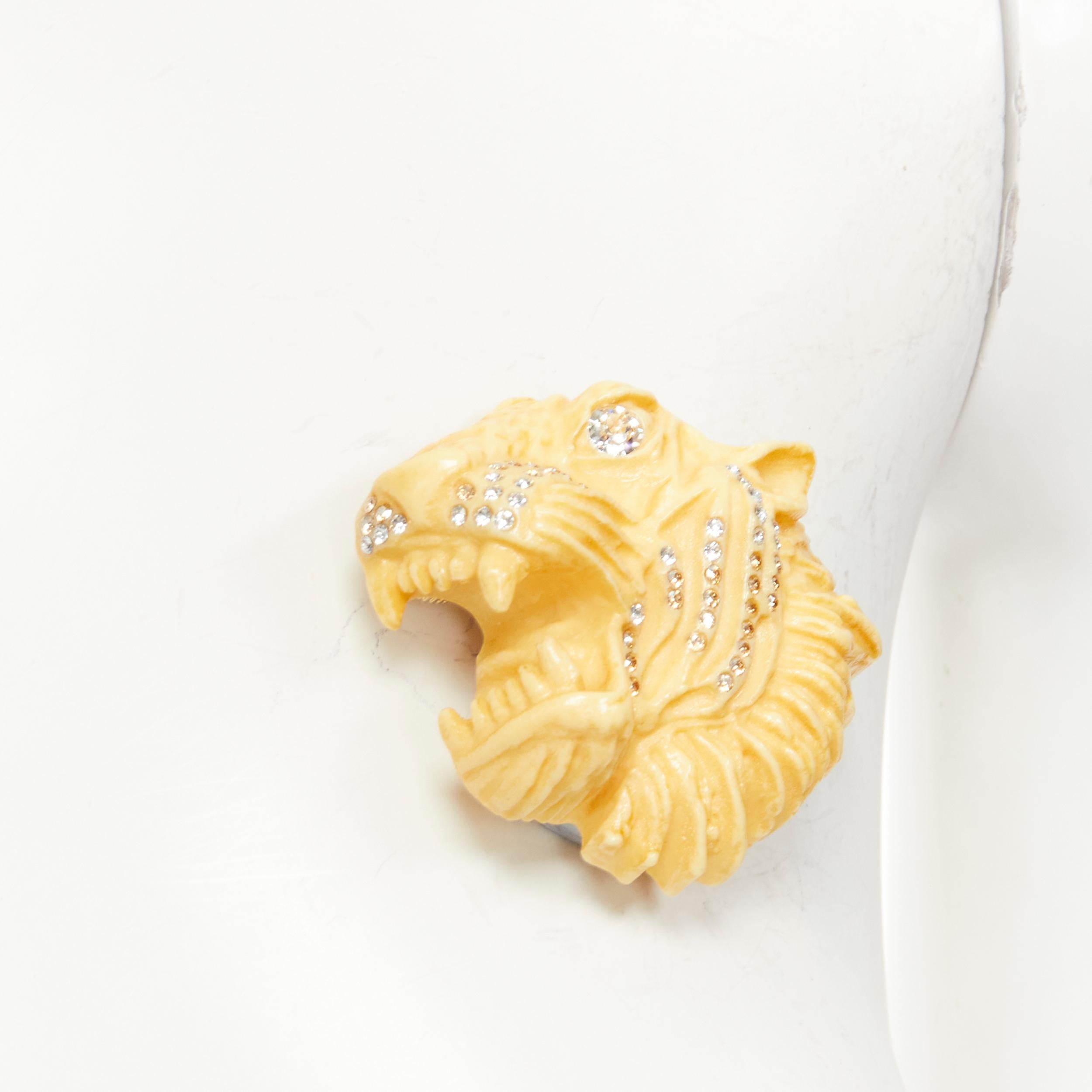 new GUCCI ALESSANDRO MICHELE Runway ivory resin crystal Tiger head pin brooch
Reference: TGAS/C01637
Brand: Gucci
Designer: Alessandro Michele
Collection: Runway
Material: Plastic
Color: Ivory
Pattern: Solid
Closure: Pin
Extra Details: Mixed color