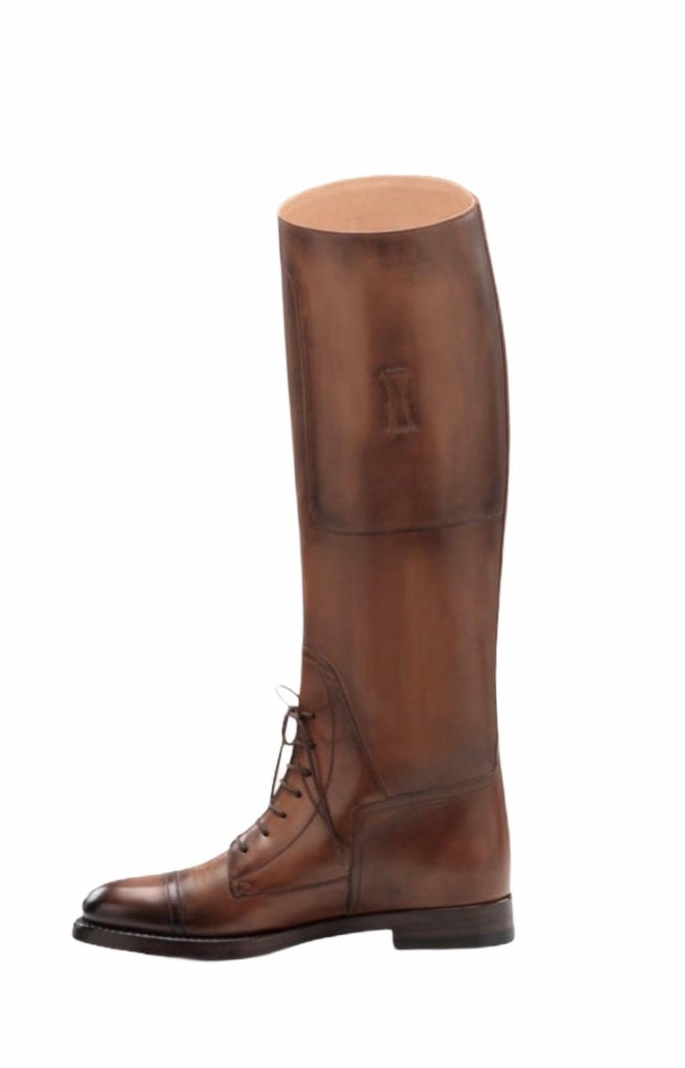 
A GUCCI  piece that will last you for years

A flared, knee-high shaft refines a laced boot burnished for an elevated finish.

GUCCI signature equestrian-inspired leather boots

Made out of finest brown calf leather in antique look
Stacked heel