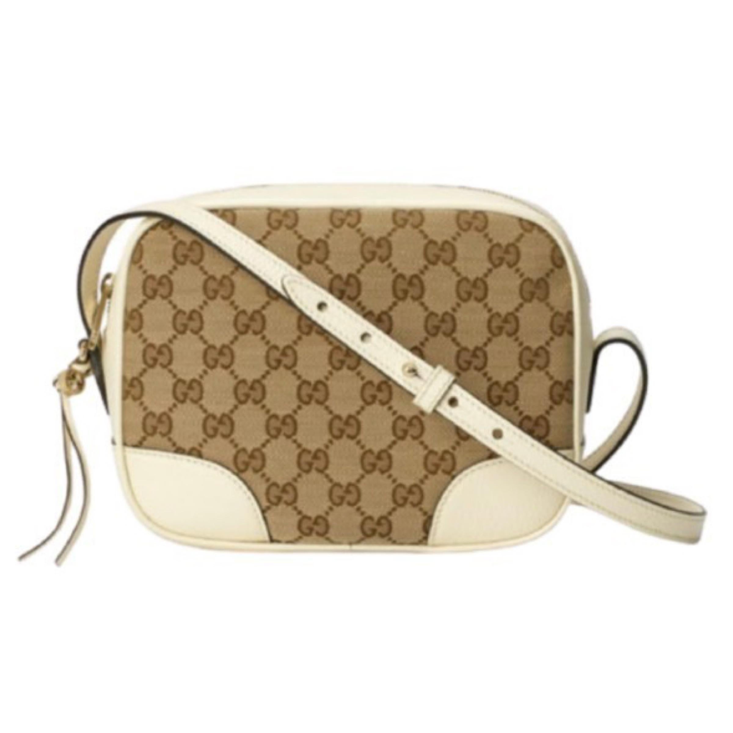 New Gucci Beige White Canvas Leather GG Guccissima Bree Crossbody Camera Bag 

Authenticity Guaranteed

DETAILS
Brand: Gucci
Condition: Brand new
Gender: Women
Category: Crossbody Bag
Style: Bree
Color: White and beige
Material: Canvas and