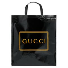 NEU Gucci Tote Bag aus beschichtetem Stoff mit schwarz-goldenem Logodruck