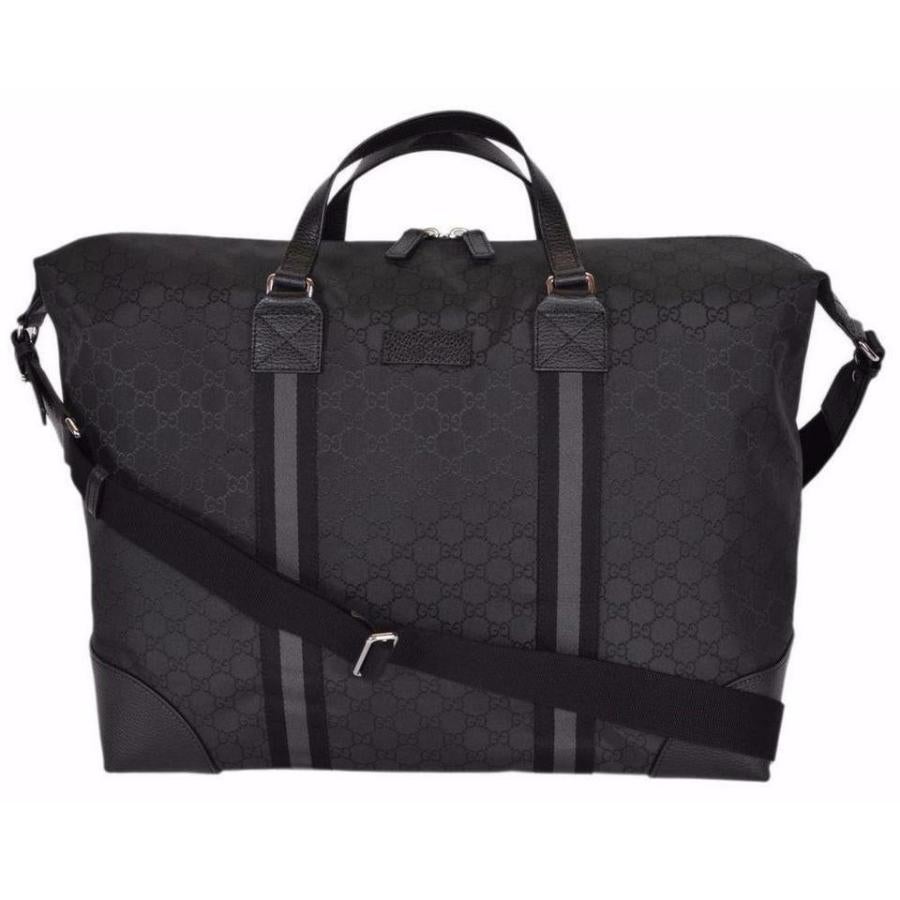 New Gucci Black Nylon GG Guccissima Large Duffle Travel Shoulder Bag 

Authenticity Guaranteed

DETAILS
Brand: Gucci
Condition: Brand new
Gender: Unisex
Category: Travel bag
Color: Black
Material: Nylon
Black leather trim
Web stripe details
Flat