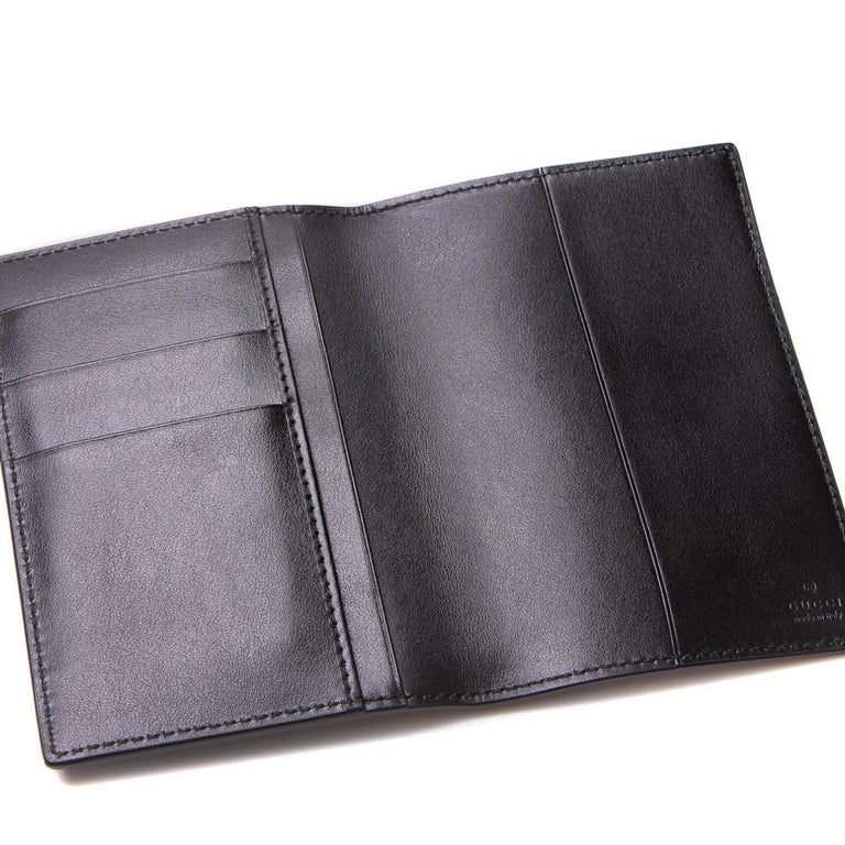 NEW Gucci Black Printed Logo Leather Passport Case Wallet For Sale at