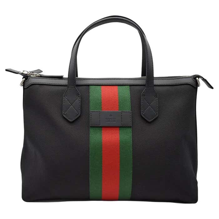 Ganni Handbag With Removable Shoulder Strap And Pendant With Logo in Black Ganni Handbag With Removable Shoulder Strap And Pendant With Logo in Black