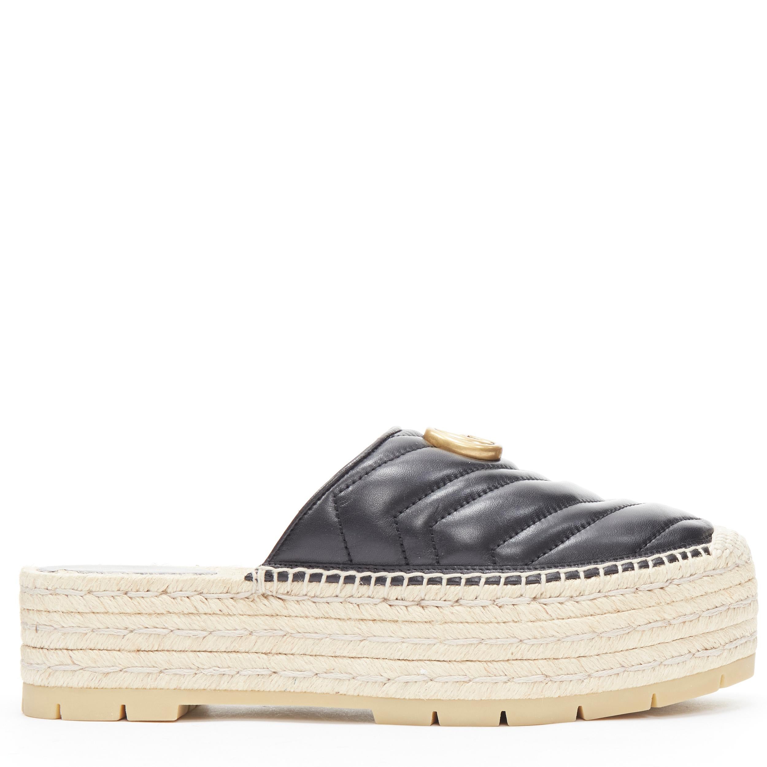 new GUCCI Charlotte Matelasse gold GG logo platform espadrille jute mule EU38.5 
Reference: TGAS/B02163 
Brand: Gucci 
Designer: Alessandro Michele 
Model: Nappa Charlotte 
Material: Leather 
Color: Black 
Pattern: Solid 
Extra Detail: Nappa