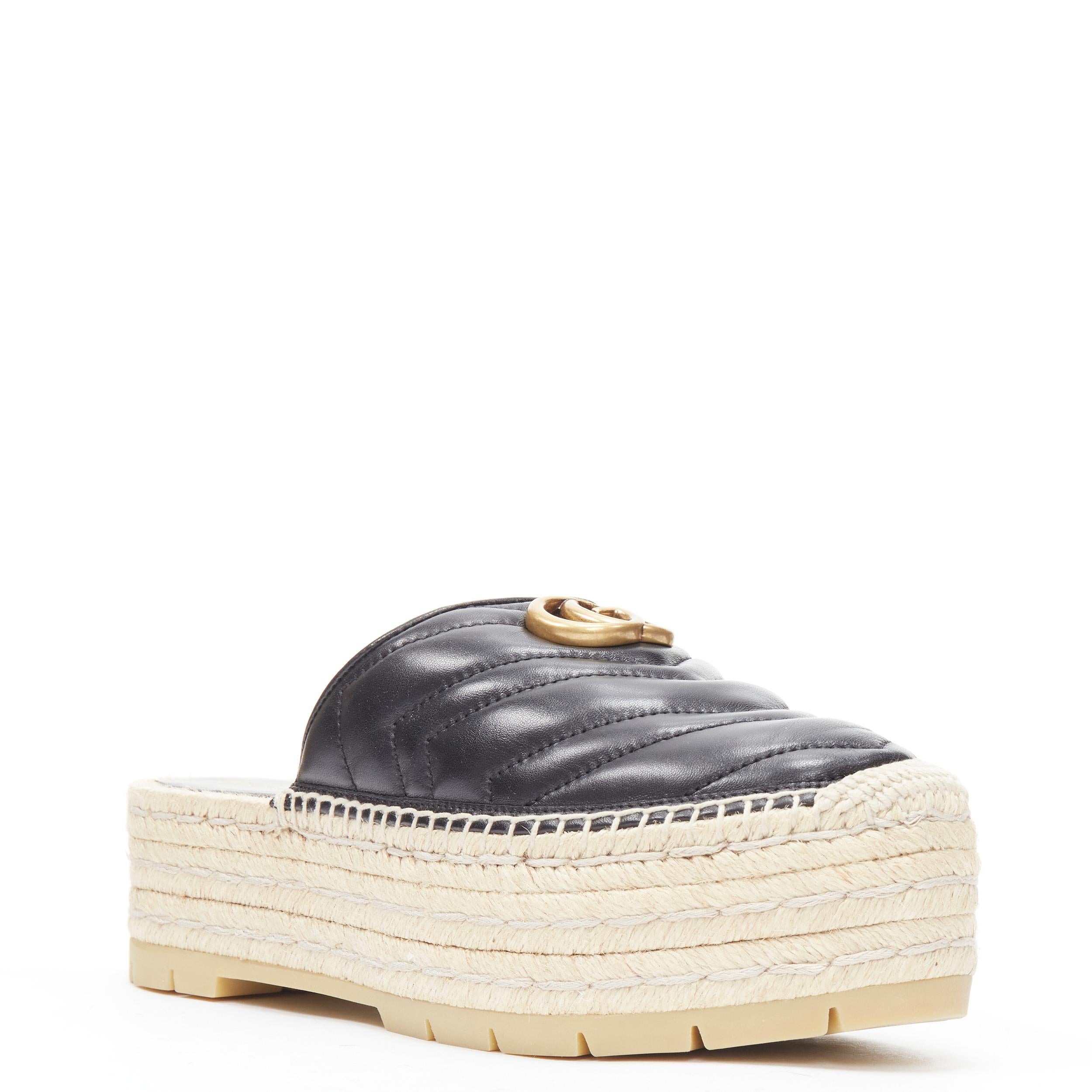new GUCCI Charlotte Matelasse gold GG logo platform espadrille jute mule EU40 
Reference: TGAS/B02164 
Brand: Gucci 
Designer: Alessandro Michele 
Model: Nappa Charlotte 
Material: Leather 
Color: Black 
Pattern: Solid 
Extra Detail: Nappa