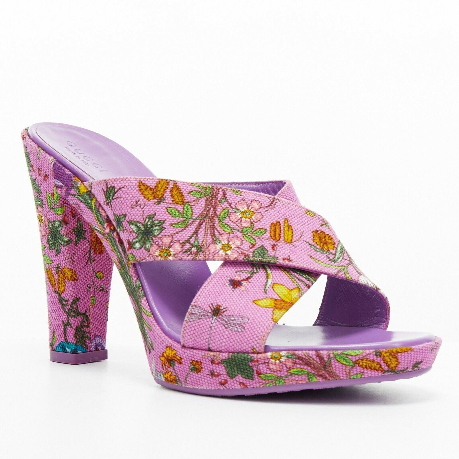 new GUCCI Flora purple floral canvas cross strap platform mule sandals EU37.5

GUCCI
Purple Flora floral print. Canvas upper. Cross strap design. Platform sole. Leather lining. Chunky sole. Made in Italy.

SIZING
Designer size: EU37.5
Size