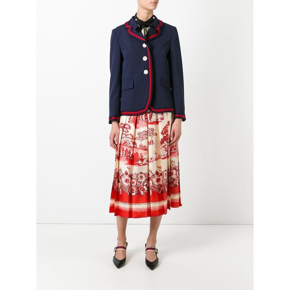 This silk-wool blend skirt from Gucci is an unmistakable example of the brand's superior craftsmanship and expert tailoring. 
Crafted from pure silk, this pleated skirt is an essential cut to carry season to season. 
Featuring a fully pleated