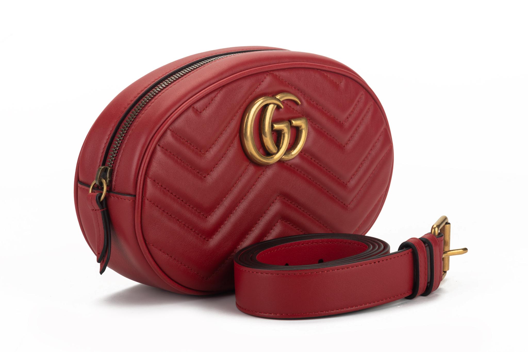 Red Gucci calfskin leather Matelasse GG large belt bag. The adjustable belt measures 43.5