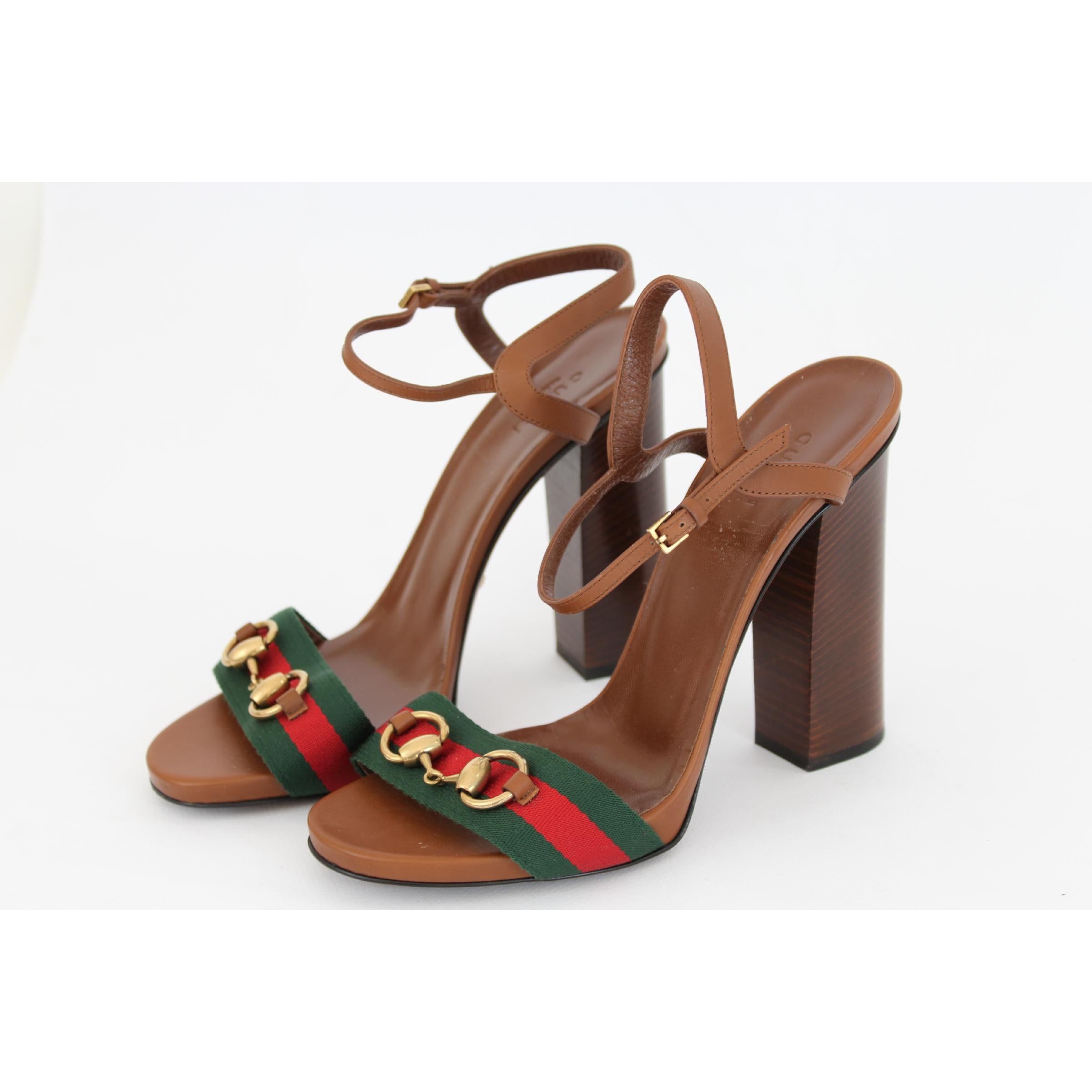Gucci women's shoes, lifford model, brown, 100% leather, green and red band in canvas. Square high heel. New without labels. Made in Italy.

Size: 39 It 8.5 Us 6 Uk
Heel: 13 cm
Internal length: 25.5 cm