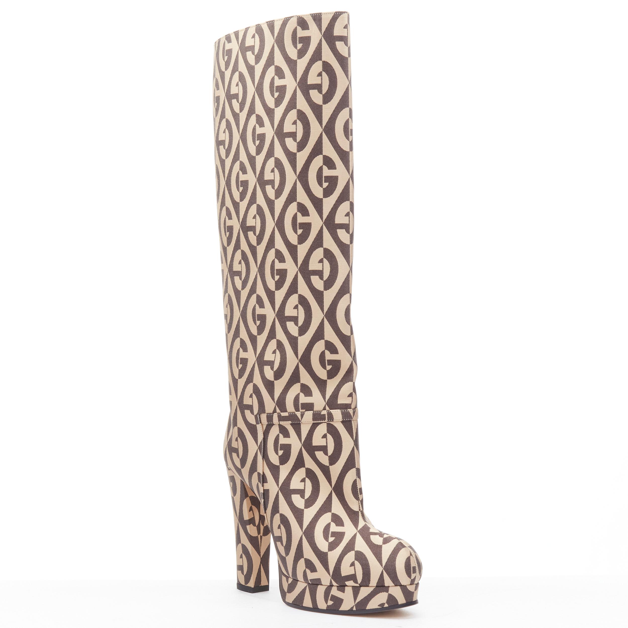 new GUCCI Mini Diamond B Face GG monogram jacquard platform boot EU36
Reference: TGAS/B01666
Brand: Gucci
Designer: Alessandro Michele
Material: Fabric
Color: Brown
Pattern: Geometric
Extra Detail: Pull on boots. 
Made in: Italy

CONDITION: