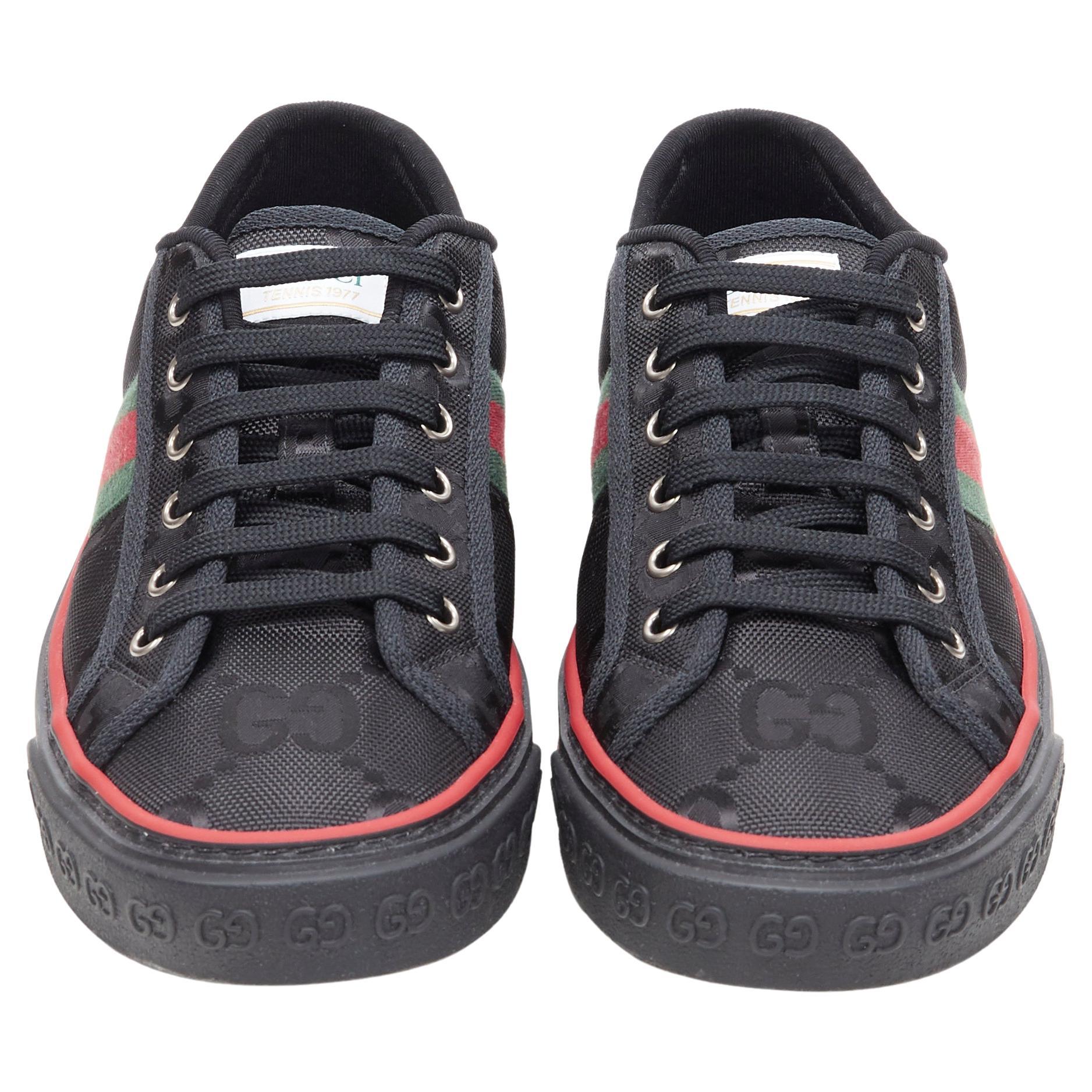 new GUCCI Off The Grid Tennis 1977 black monogram red green web sneaker UK8 Reference: JOMK/A00006 
Brand: Gucci 
Designer: Alessandro Michele 
Model: Tennis 1977 
Material: Nylon 
Color: Black 
Pattern: Solid 
Closure: Lace Up 
Extra Detail: Part