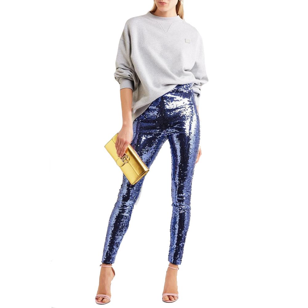 Made from tulle, these leggings are saturated with iridescent purple sequins that appear to dance beneath light. 
Replicate the runway by wearing yours with a printed top, or choose a sweatshirt for a look that's a little more effortless.

Purple