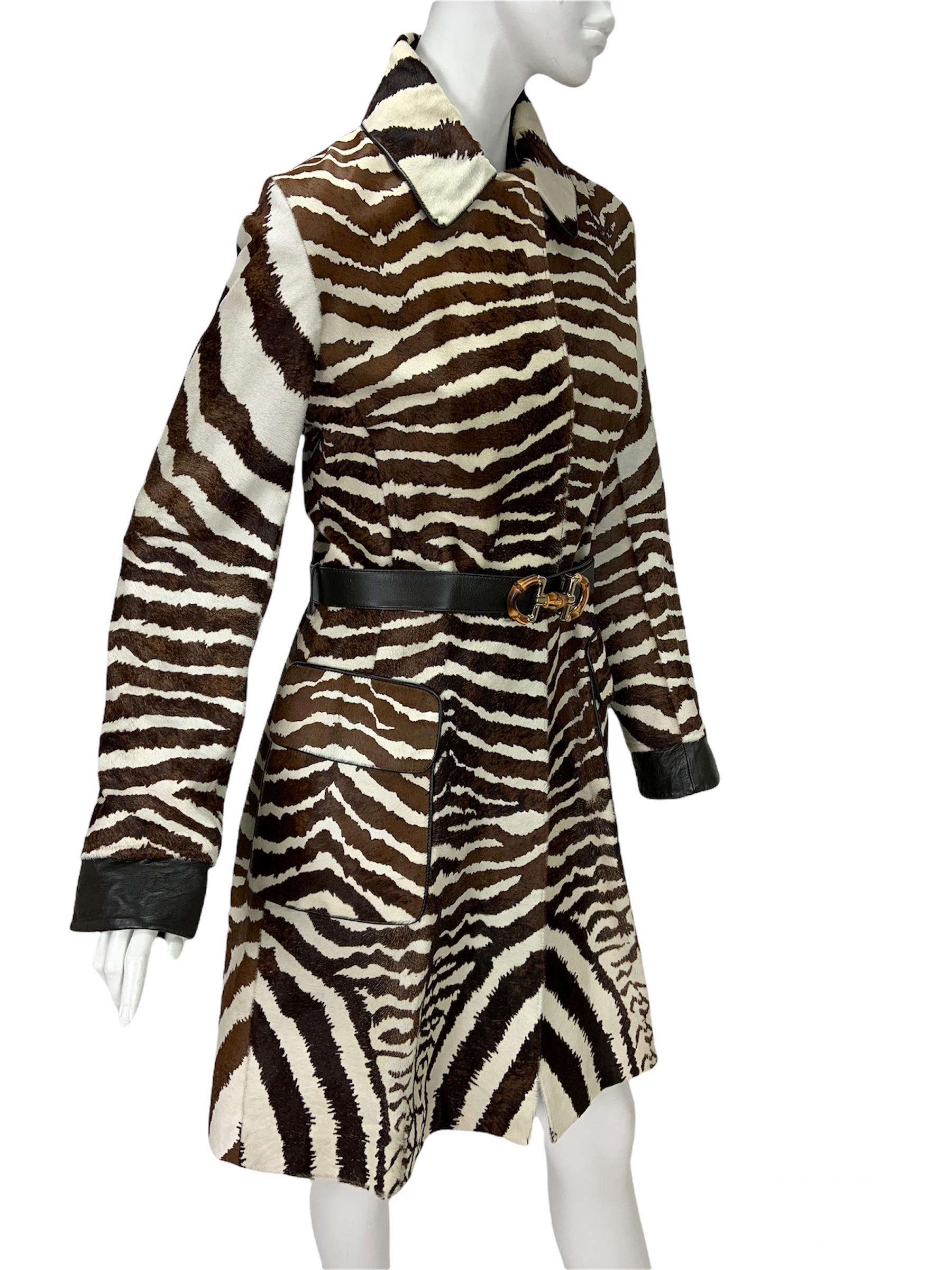 New Gucci Leather Animal Print Belted Coat
S/S 2006 Collection
Designer size 46 - US 10
A-Line Style, Leather, Pony Hair, Animal Print, Two Front Deep Pockets, Hidden Button Closure, Black Leather Details, Removable Leather Belt with Iconic Gucci