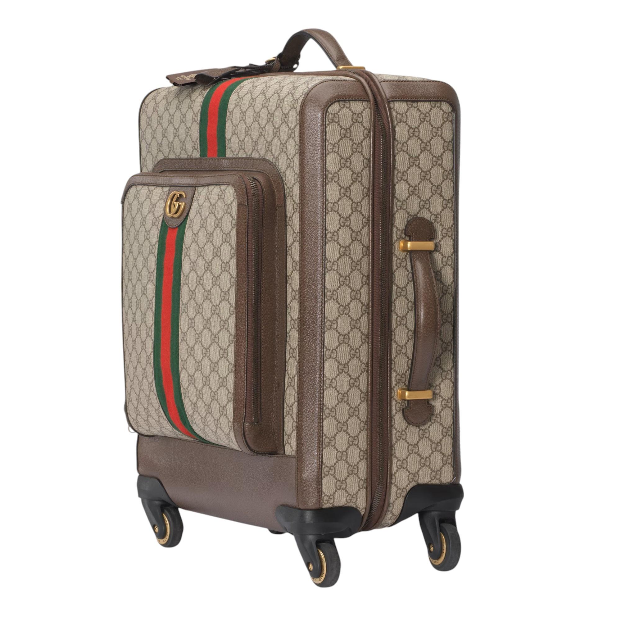Brand New With Tags, Dust Cover, Lock and Keys
Gucci Medium Savoy Carry-On Plus Trolley Suitcase
$3550
Inspired by the summer spirit and beach clubs on the Italian coast, this item is part of Gucci Lido. 

Beige and ebony GG Supreme canvas
Brown