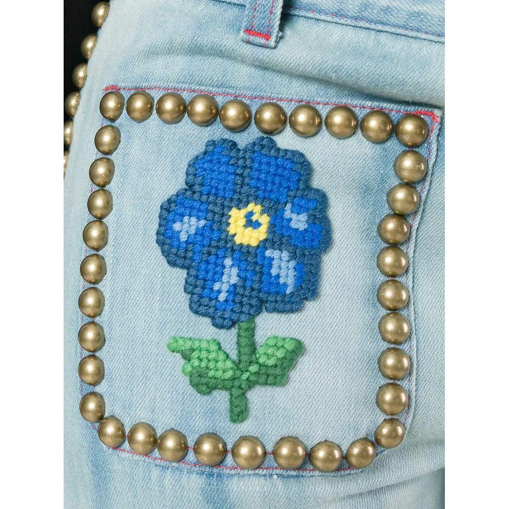 Washed blue cotton studded flared jeans from Gucci featuring a waistband with belt loops, a button and zip fly, front pockets, back pockets, an embroidered floral design and stud detailing.
Designer Style ID: 471923XR548
Colour: 4205 Made in